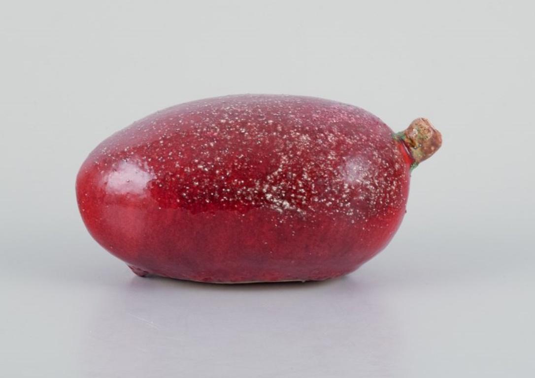 Linda Mathison, a contemporary Swedish ceramic artist.
Unique ceramic sculpture in an organic form with red glaze.
In perfect condition.
Signed and dated 1999.
Dimensions: L 14.0 cm x W 7.5 cm x H 6.0 cm.
