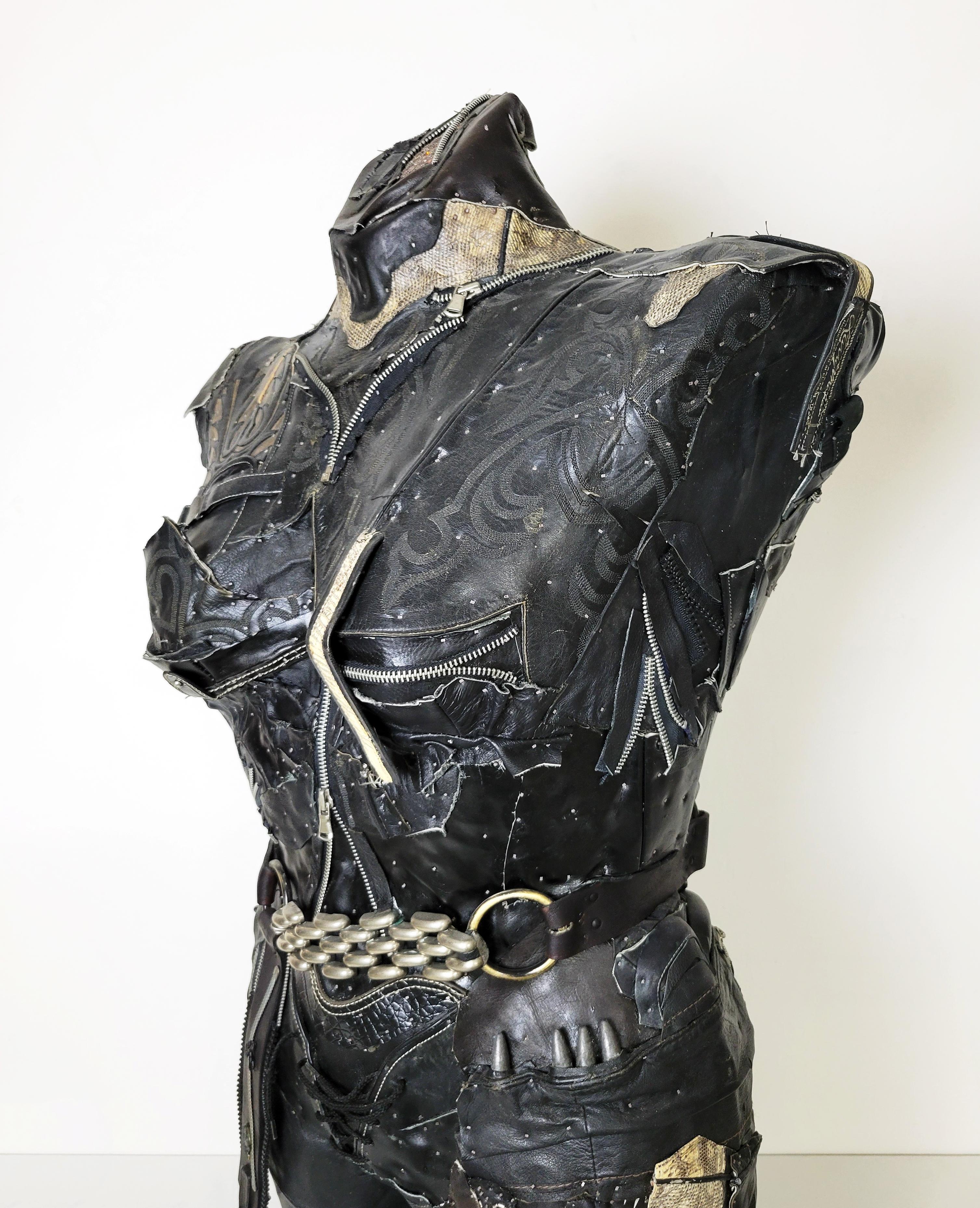 Linda Stein, Need's Answer 741 - Feminist Contemporary Black Leather Metal Torso Sculpture 

Starting in 2007, the artist Linda Stein began to explore gender multiplicities and diversities in her sculptural series The Fluidity of Gender.  The