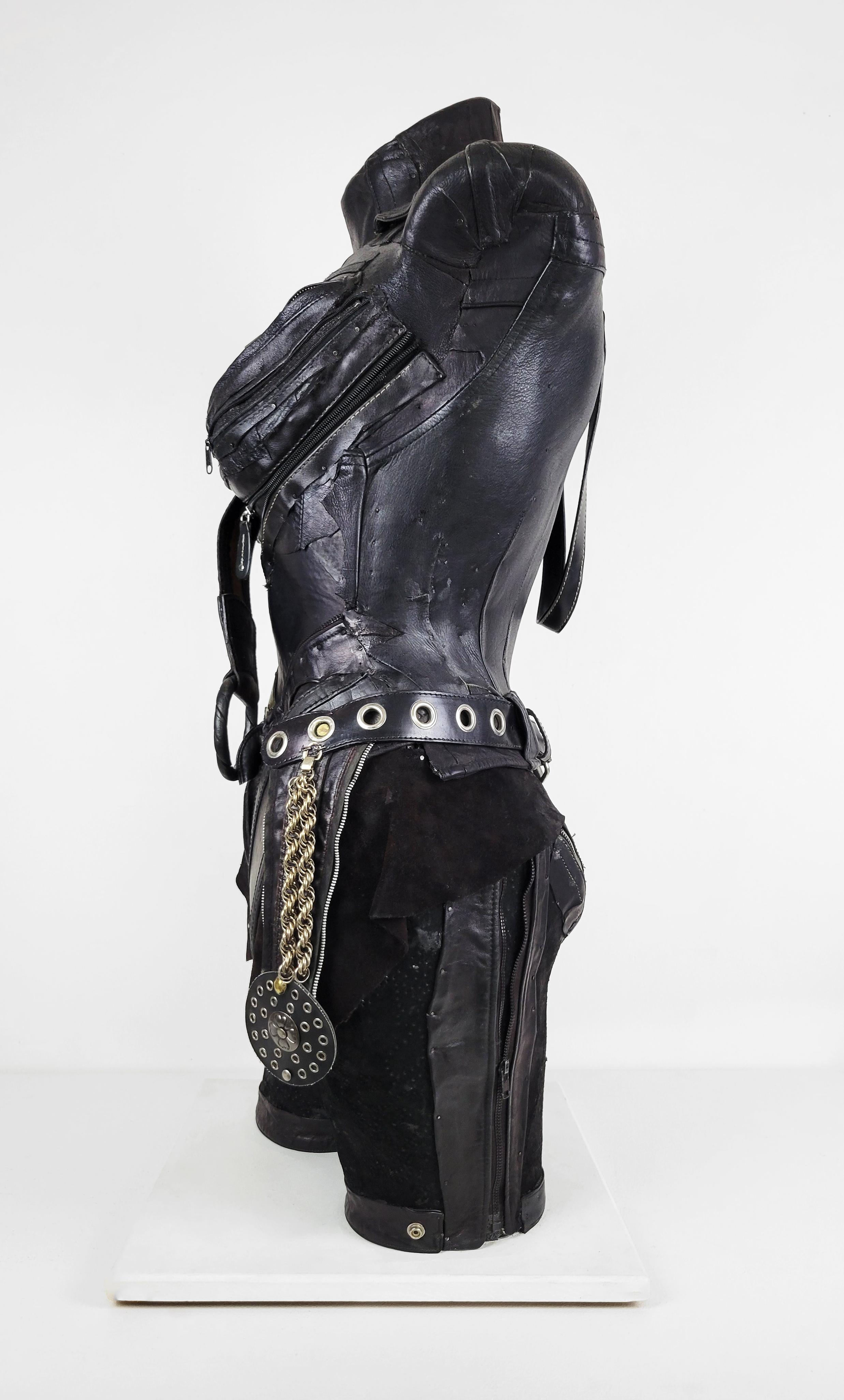 Linda Stein, MascuFem 681 - Feminist Contemporary Black/Silver Leather Metal Torso Sculpture 

Starting in 2007, the artist Linda Stein began to explore gender multiplicities and diversities in her sculptural series The Fluidity of Gender.  The
