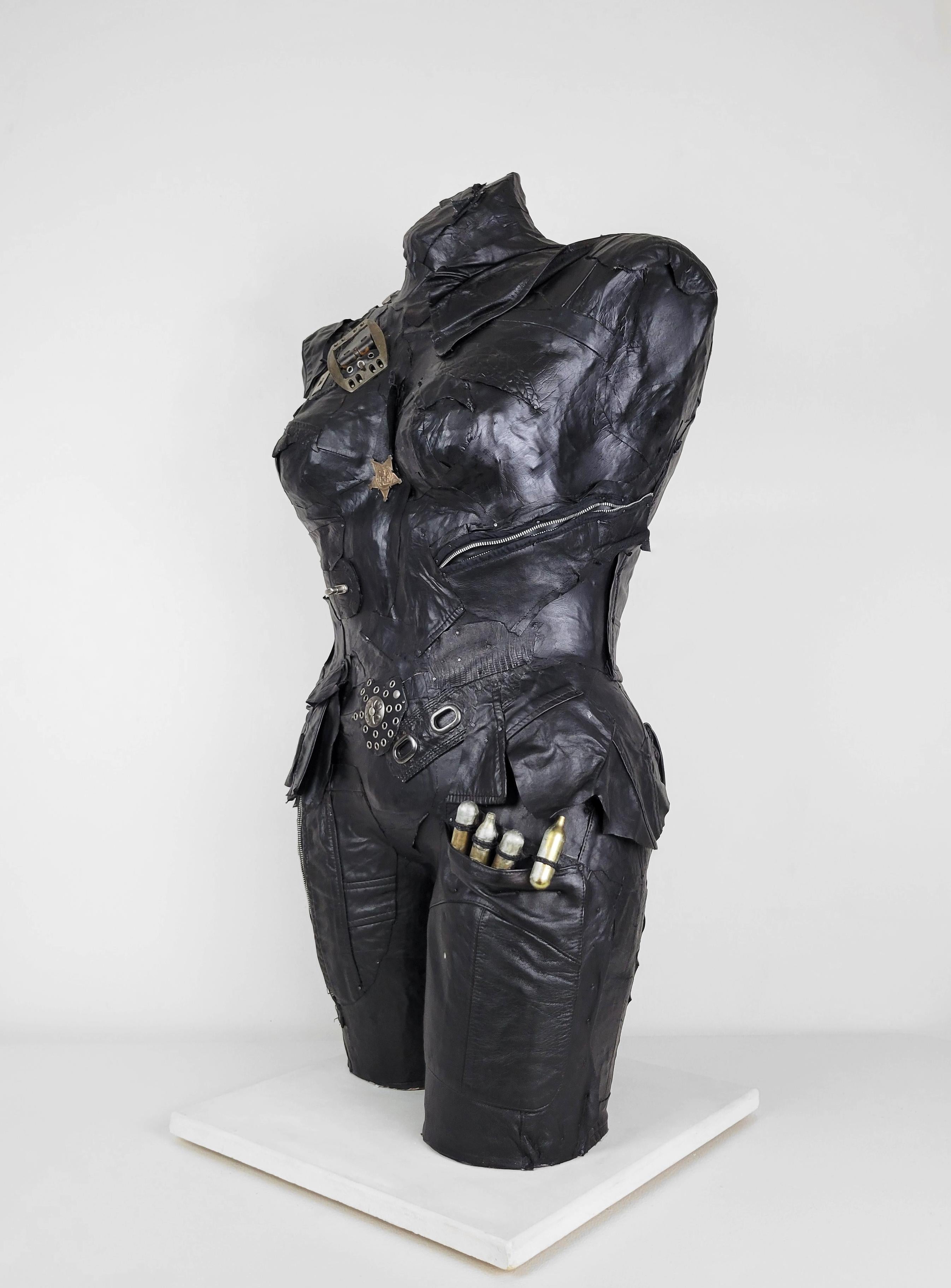 Linda Stein, In Charge 694 - Feminist Contemporary Black/Silver Leather Metal Torso Sculpture 

Starting in 2007, the artist Linda Stein began to explore gender multiplicities and diversities in her sculptural series The Fluidity of Gender.  The