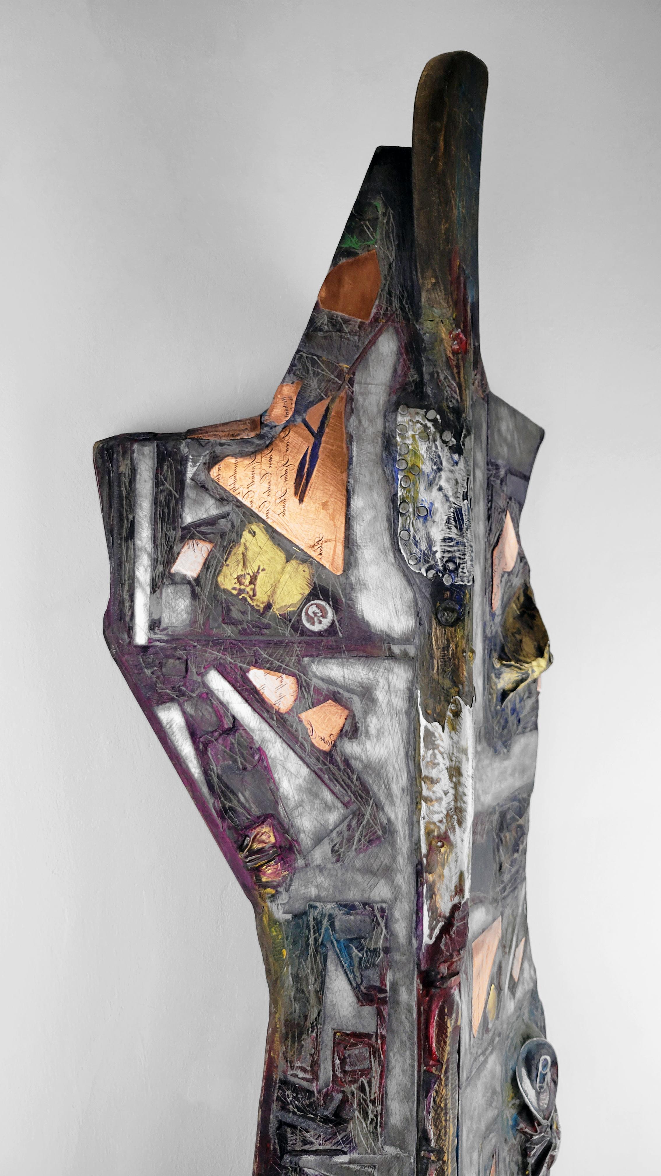 Slow Curve 352 is from Linda Stein’s Knights of Protection series, which are shield-like forms made of mixed media that hang on the wall. They function simultaneously as defenders in battle, symbols of protection and emblems of pacificism.

This