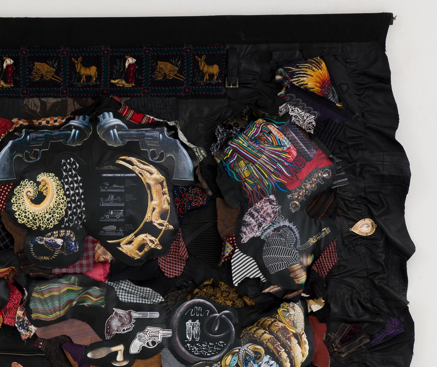 Linda Stein, Growing Up Female 931 - Feminist Contemporary Fabric Leather Sculptural Tapestry 

Growing Up Female: Jewelry, Guns, Landmines 931 is from Linda Stein's Sexism series, which advocates an expanded perspective of gender constructions--one