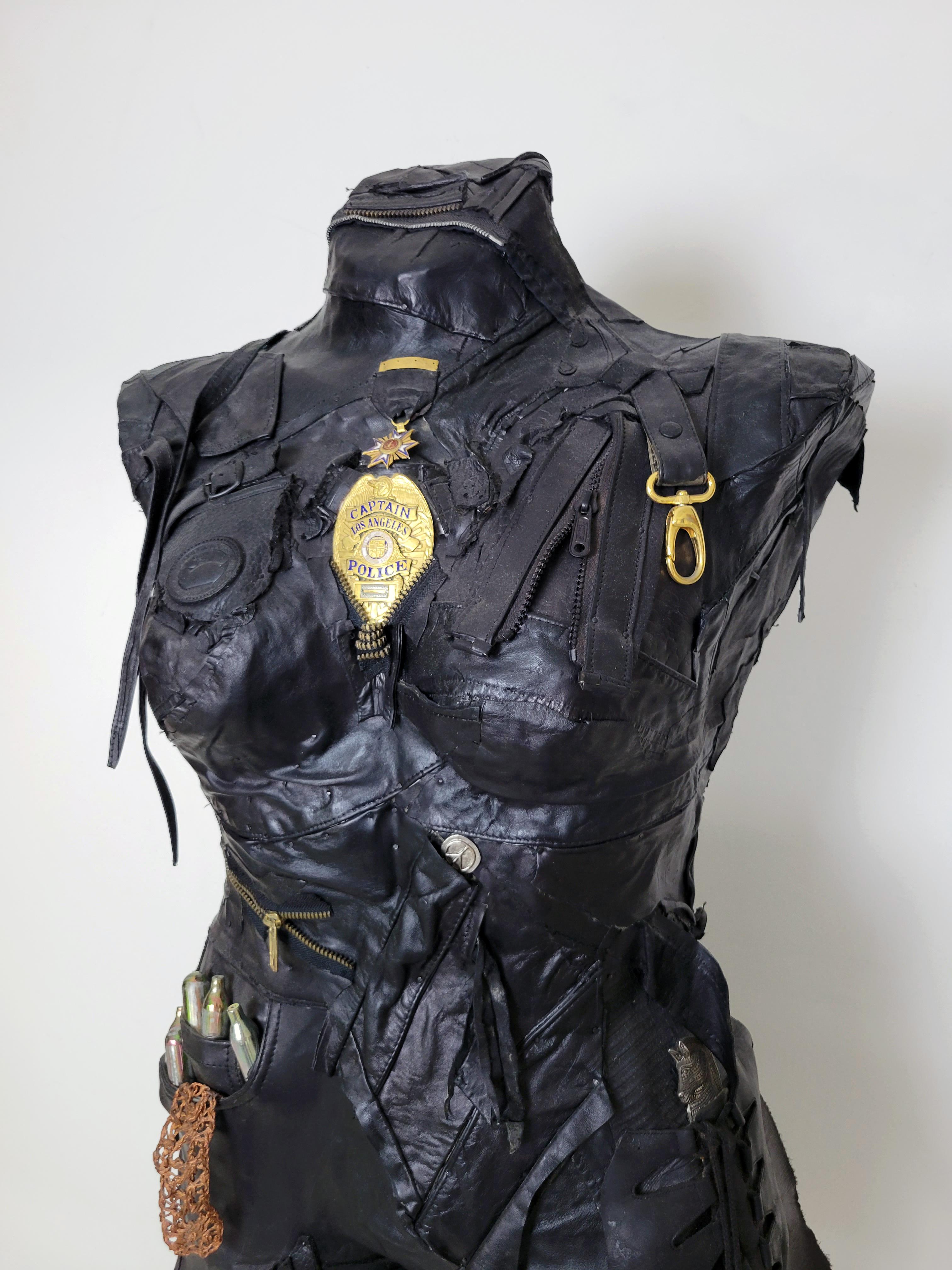 Linda Stein, Captain 701 - Feminist Contemporary Black/Silver Leather Metal Torso Sculpture

Starting in 2007, the artist Linda Stein began to explore gender multiplicities and diversities in her sculptural series The Fluidity of Gender.  The