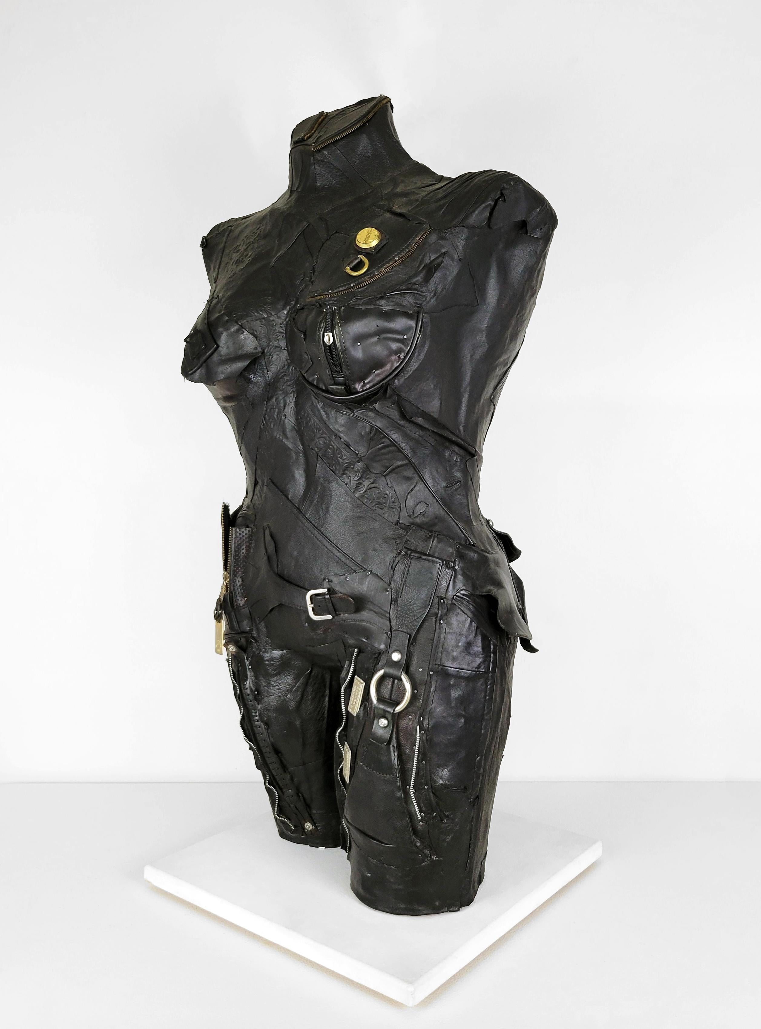 Linda Stein, Defender 696 - Feminist Contemporary Black/Silver Leather Metal Torso Sculpture 

Starting in 2007, the artist Linda Stein began to explore gender multiplicities and diversities in her sculptural series The Fluidity of Gender.  The