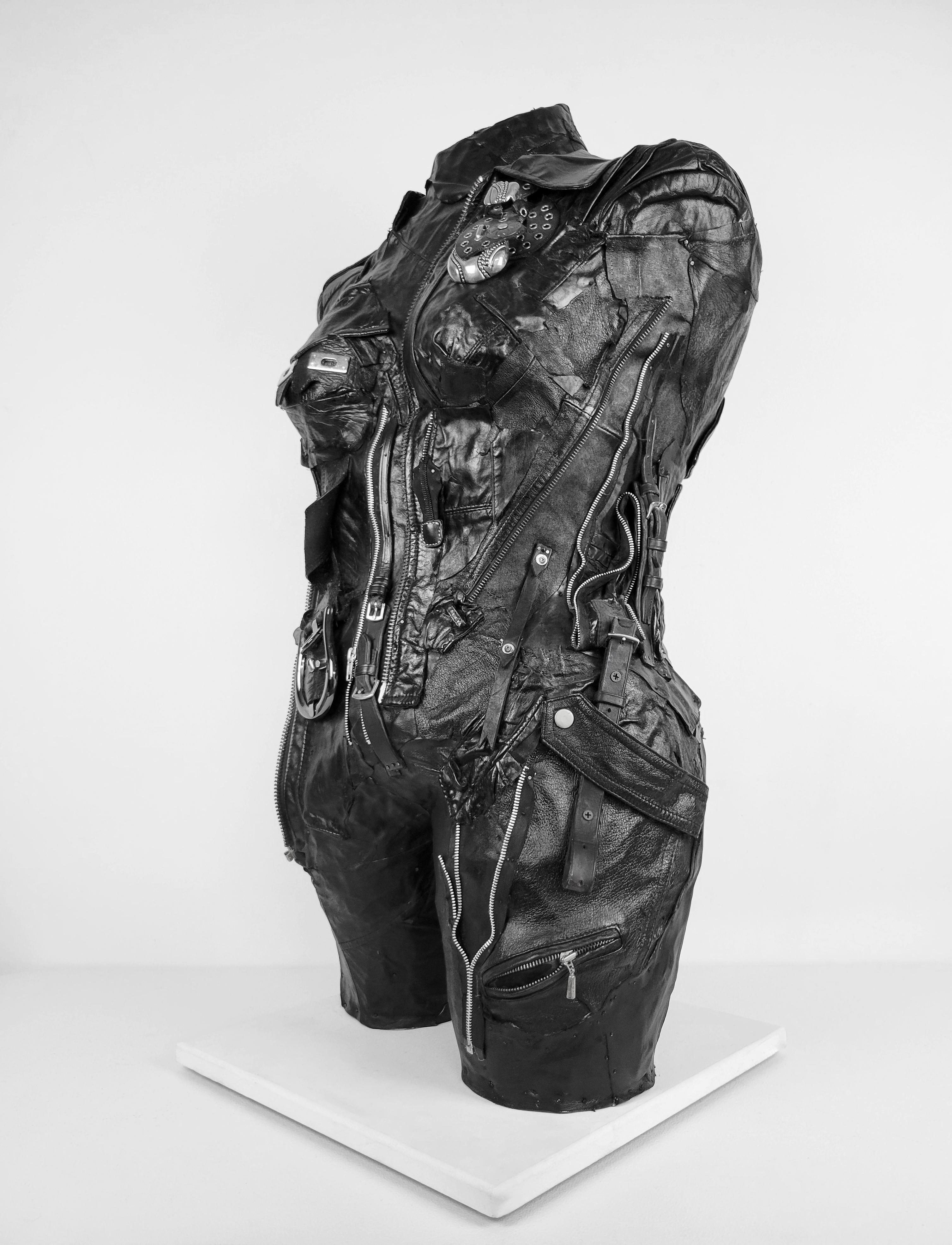 Linda Stein, On Alert 691 - Feminist Contemporary Black/Silver Leather Metal Torso Sculpture 

Starting in 2007, the artist Linda Stein began to explore gender multiplicities and diversities in her sculptural series The Fluidity of Gender.  The