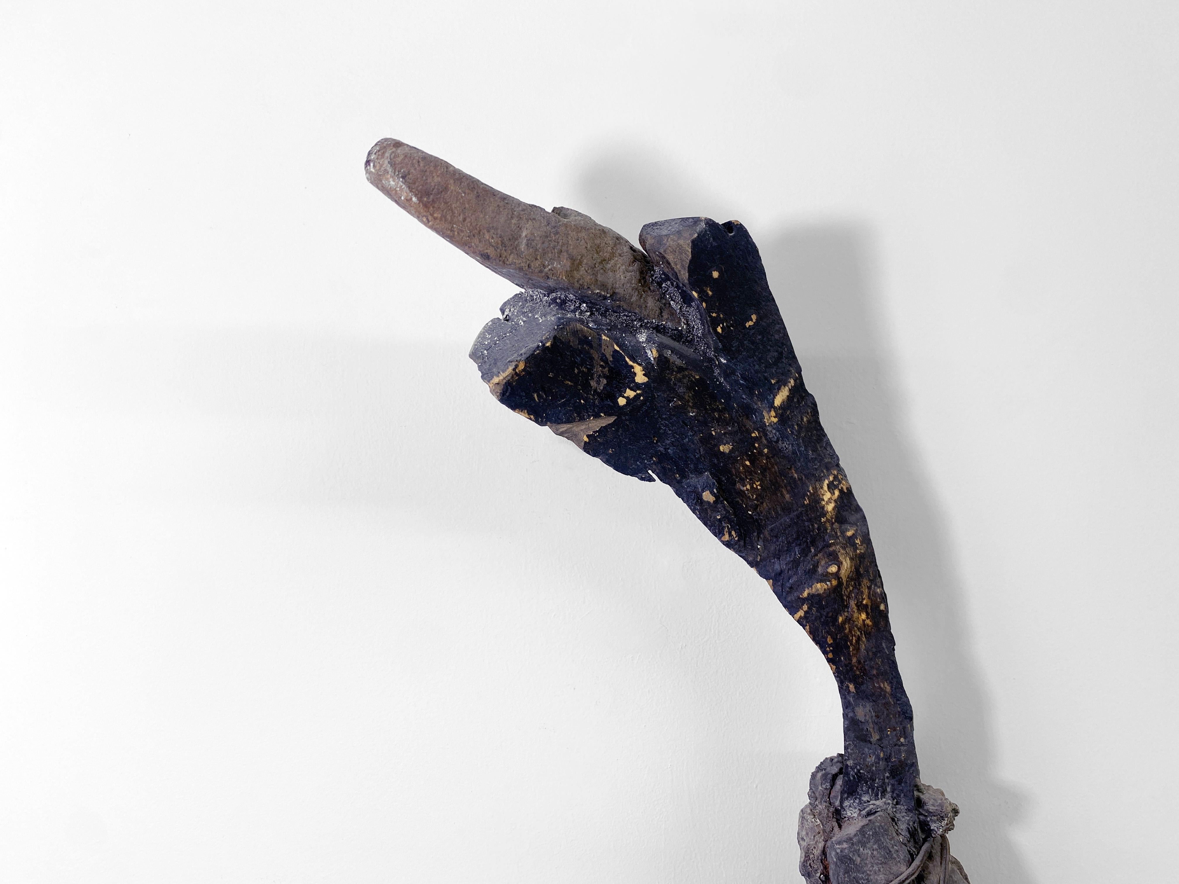 Linda Stein, Rocking Staff 171  - Wood, Metal, Stone, Mixed Media Contemporary Sculpture 

In the 1980s, Linda Stein began a series called Ceremonial Scepters, where she imagined an excavation by anthropologists who discovered that a long-lost