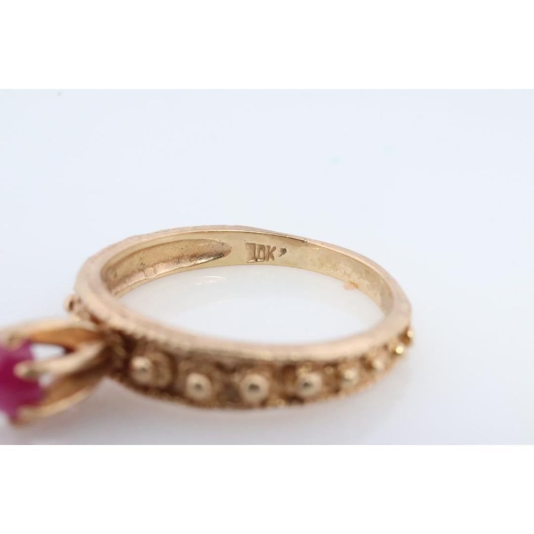 Bague solitaire Linde, rubis rose étoilé rouge. Or jaune 10 carats. en vente 5