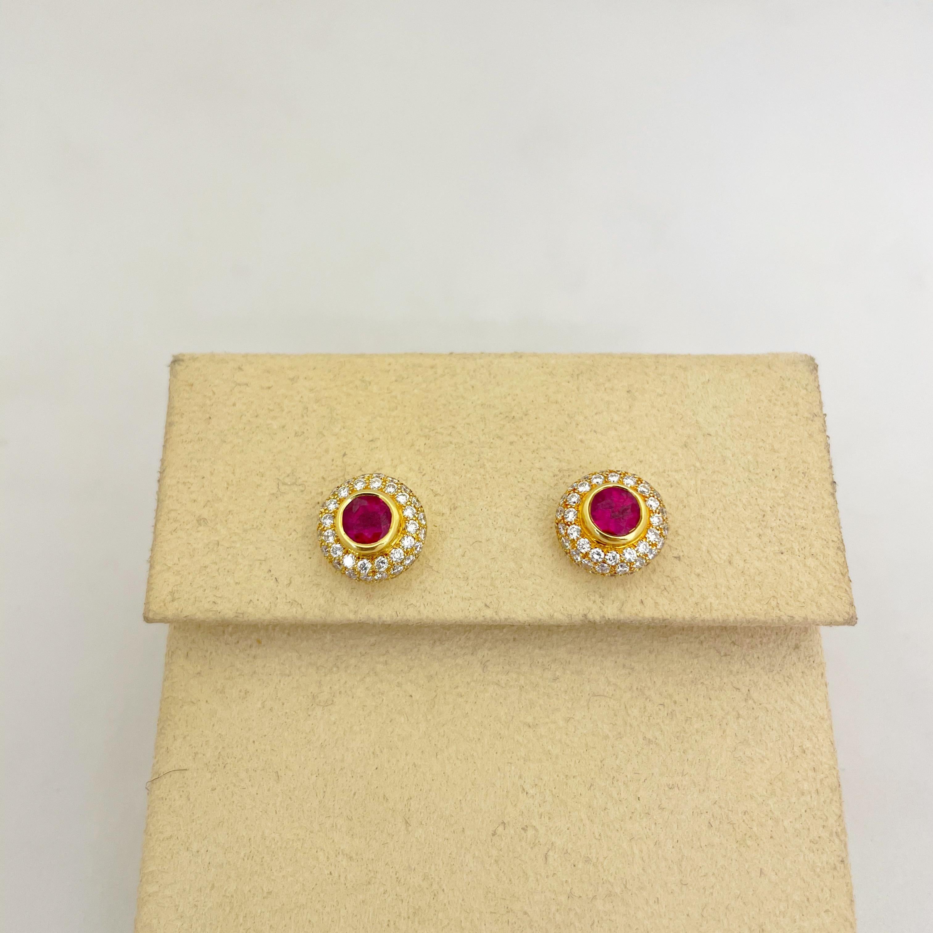 These beautiful studs feature 1.48cts of round rubies bezel set in 18kt yellow gold among 1.37cts of white round brilliant pave diamonds. 
These unique studs are easy to wear both day and night, casual or dressy.
Signed Linderman
