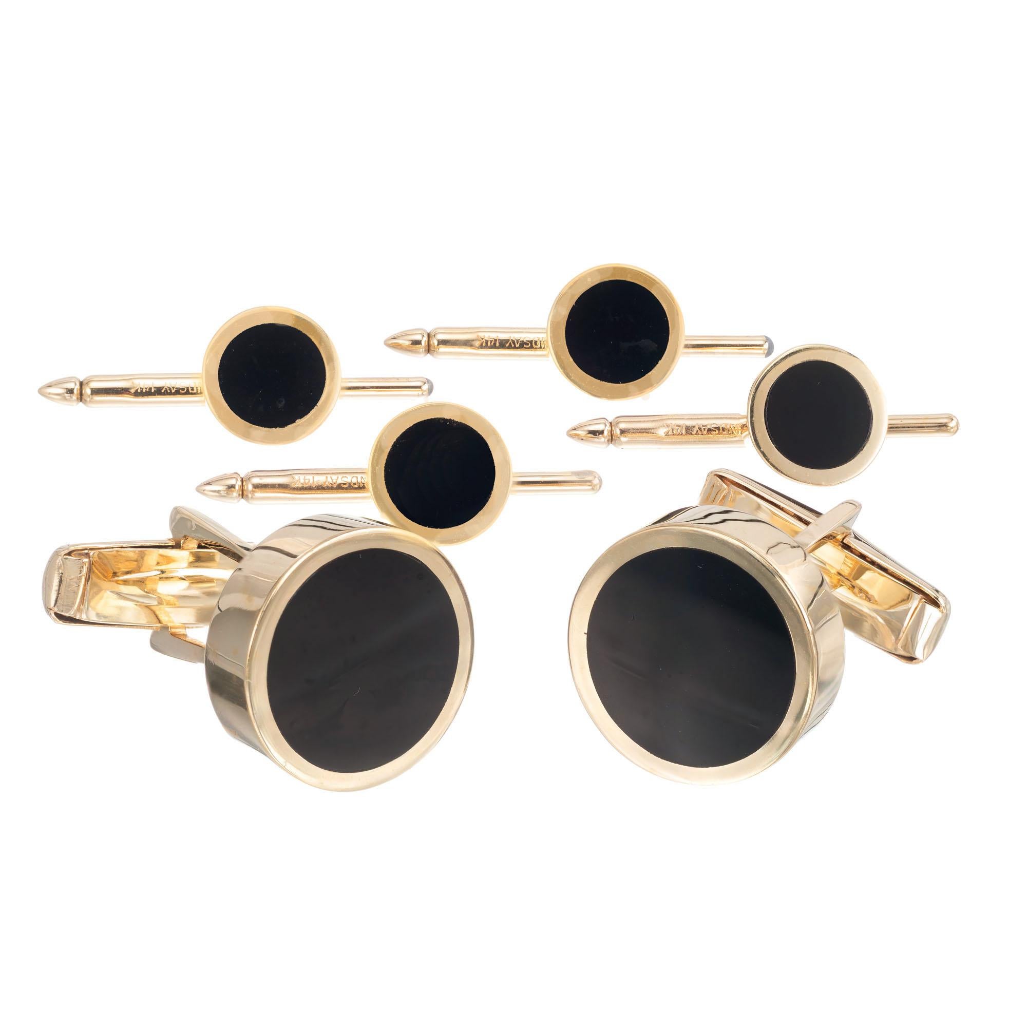 Classic black onyx and 14k yellow gold cufflink and complete shirt stud set 

2 round black onyx slices 13.45mm
4 round black onyx slices 7mm
14k yellow gold
Stamped: 14k
Hallmark: Lindsay
27.4 grams
Top to bottom: 15.95mm or 5/8 Inch
Width: 15.9mm
