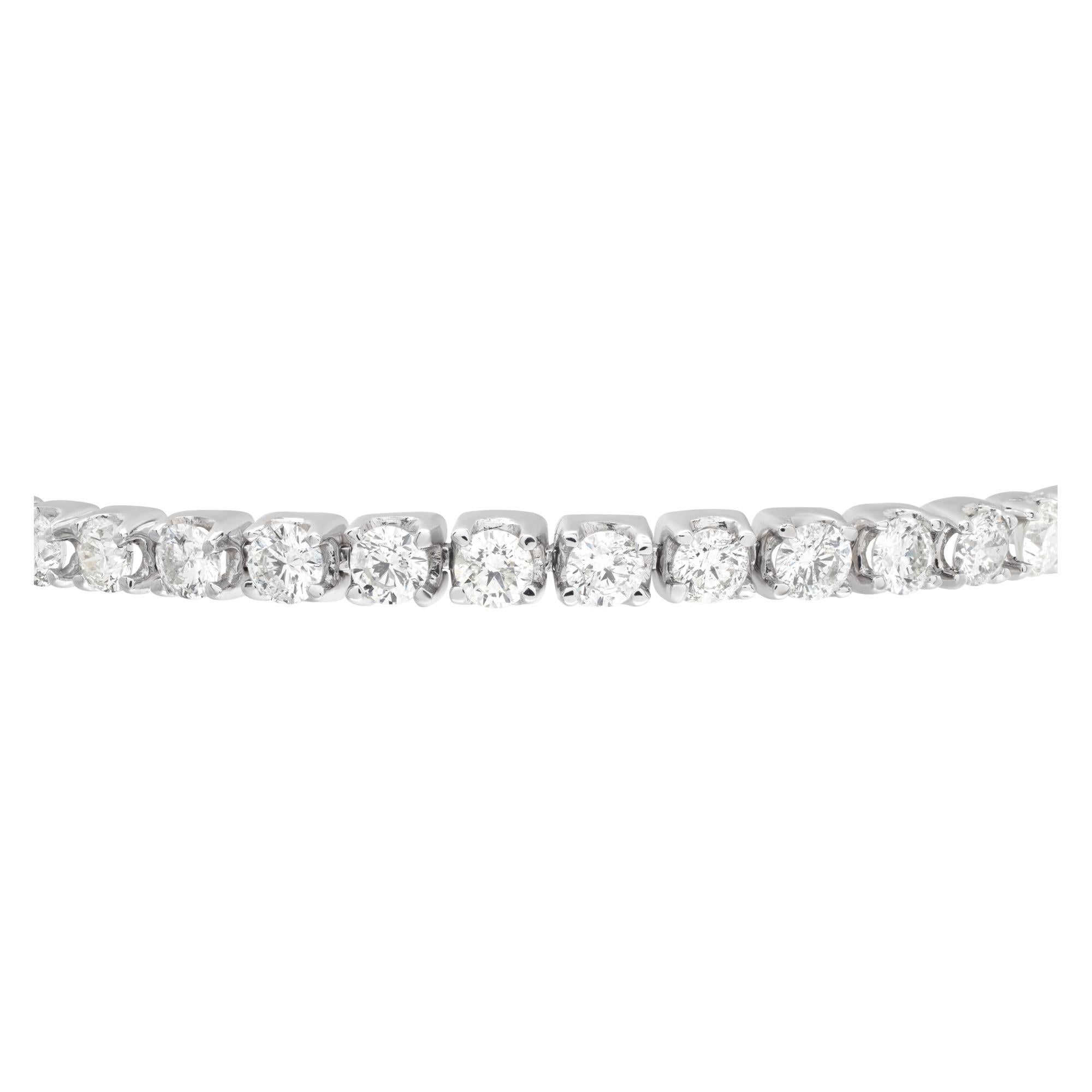Sparkling line diamonds bracelet with approx. 8.49 carat round brilliant full cut diamond set in 14K white gold. Diamonds estimate H-I color, SI clarity. Length 8 inches.
