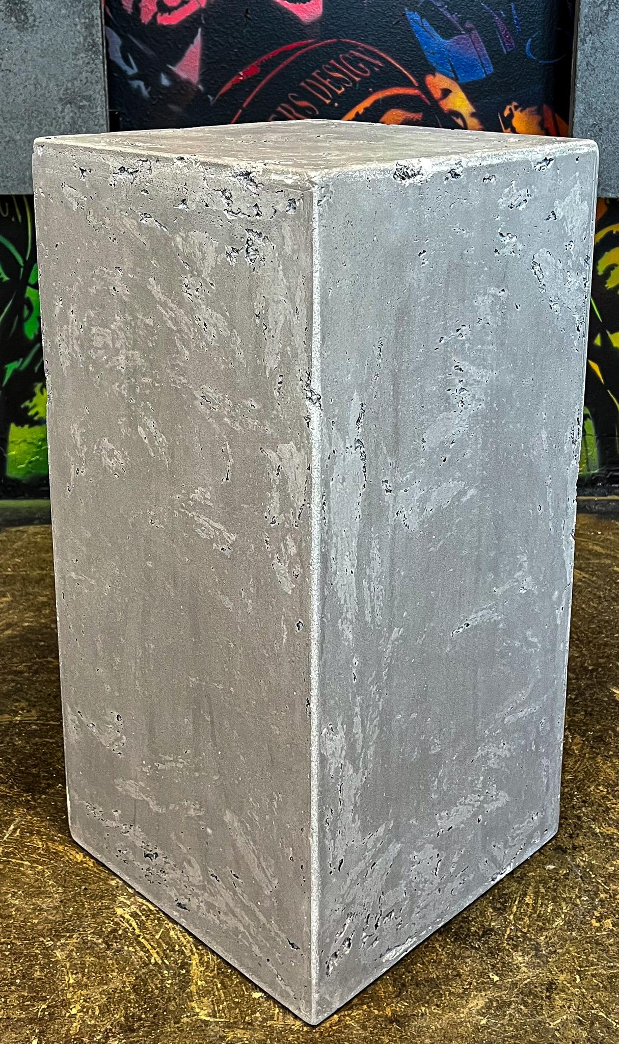 Elevate your decor with our Line RAW CONCRETE, a one-of-a-kind masterpiece that will elevate any space. Though uniform in size and color, the unique texture and stunning imperfections, such as strike marks and other details, make each cylinder truly