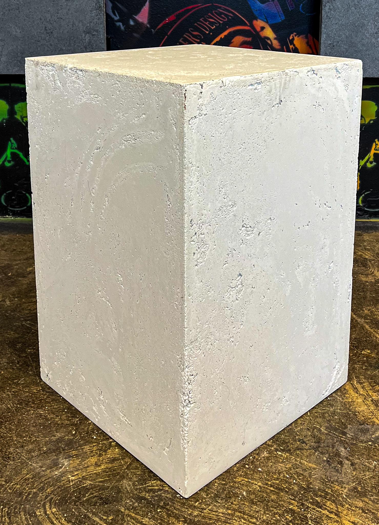 Elevate your decor with our Line RAW CONCRETE, a one-of-a-kind masterpiece that will elevate any space. Though uniform in size and color, the unique texture and stunning imperfections, such as strike marks and other details, make each cylinder truly