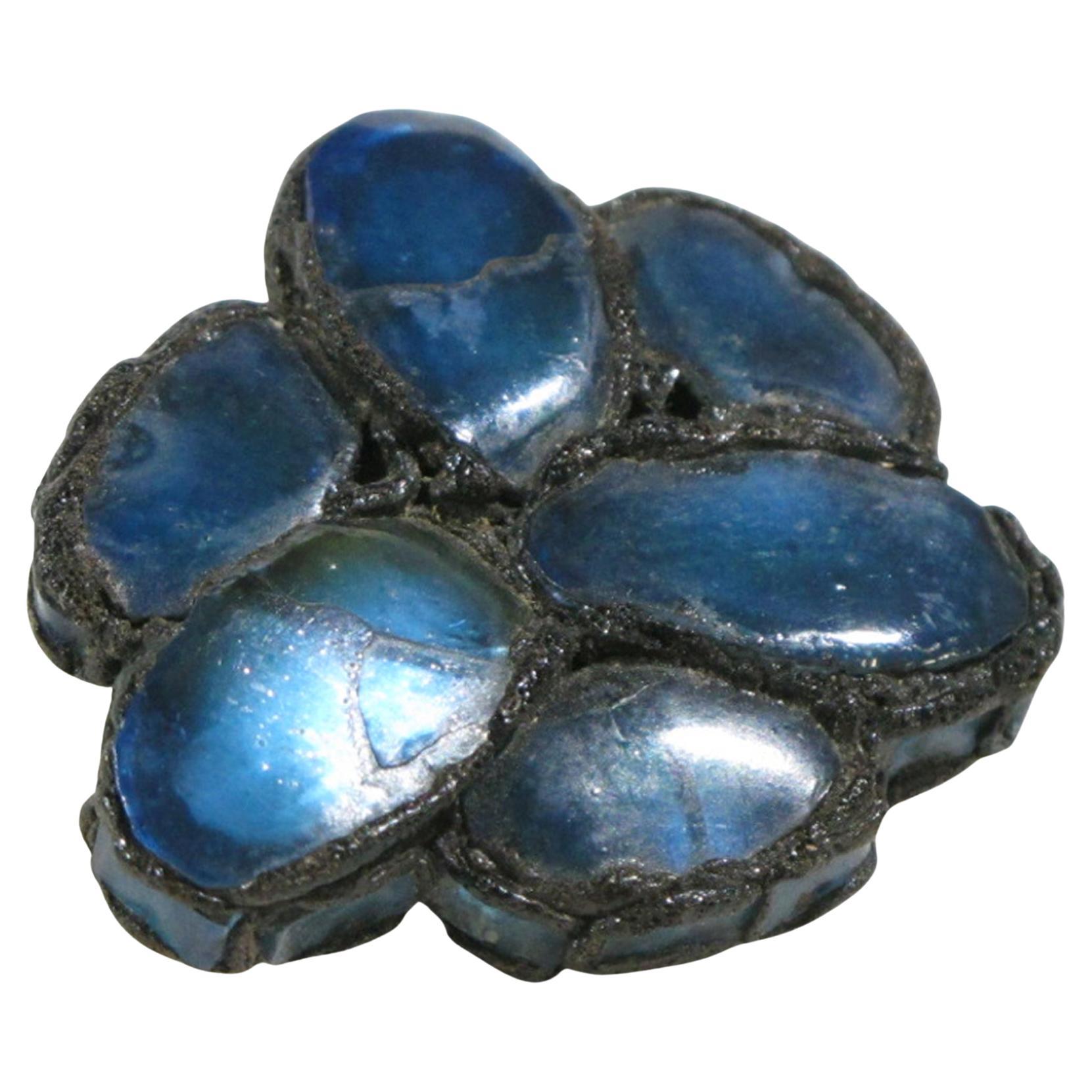 Line Vautrin Spilla con specchi blu e talosel nero