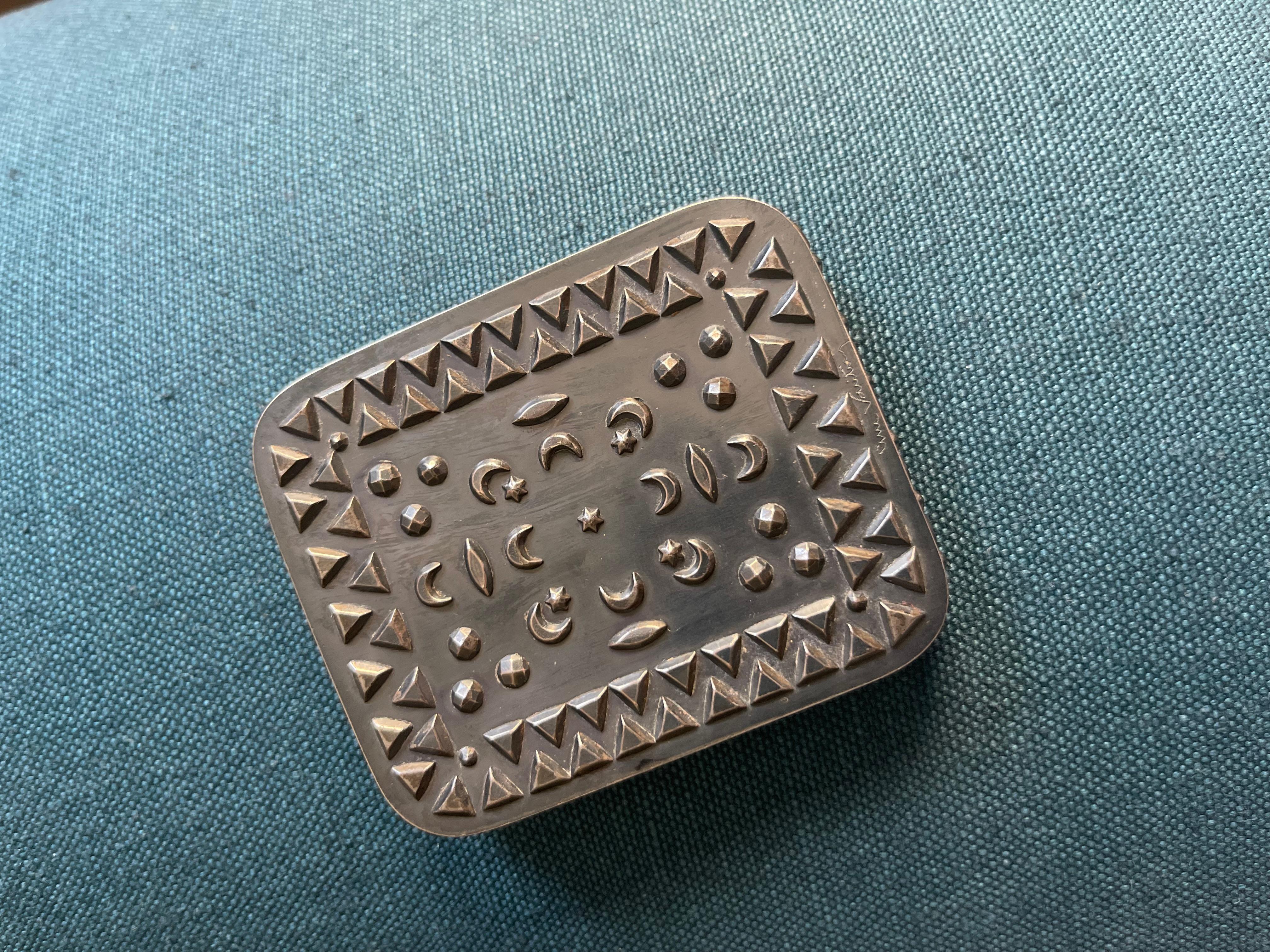 Portman Gallery is pleased to offer a Line Vautrin compact/poudrier in bronze.  At first I thought that the lack of gilt must have been some kind of mistake, but this is actually a rare example of a box made by Line Vautrin that was never gilded. 