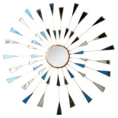 A Blue and White Colored Glass mirror, in the style of Line Vautrin.