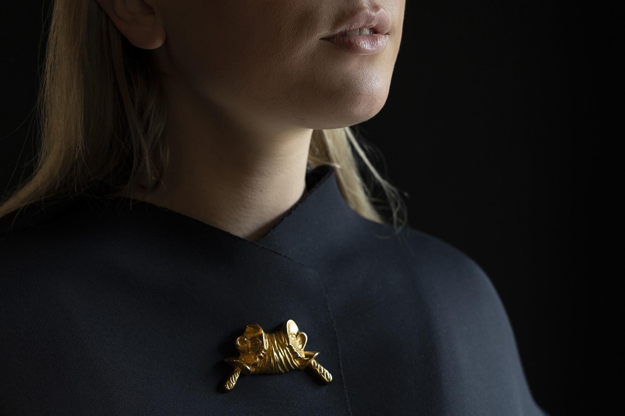 This brooch, in gilded bronze named 