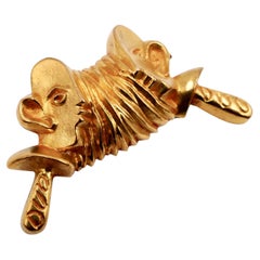 Line Vautrin broche de bronce dorado "Les Marottes" (Las Marionetas)