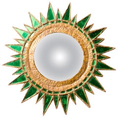 A sunburst Convex Mirror, in the style of Line Vautrin