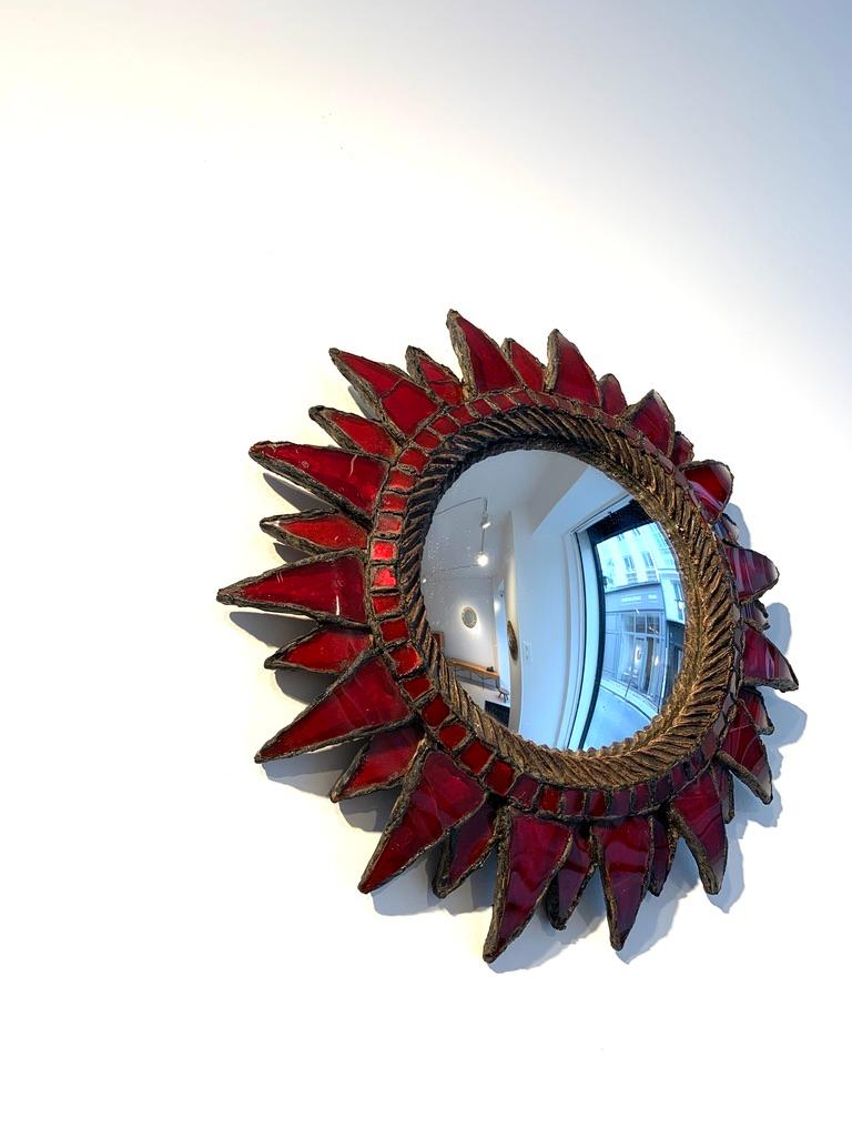 Line Vautrin's ‘Soleil à Pointes n. 2’ red mirror 
1955
Talosel resin and convex mirror 