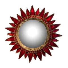 Line Vautrin's ‘Soleil à Pointes n. 2’ red mirror from the '50s