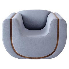 Linea Armchair, COM upholstered with walnut detail, by Estudio Persona