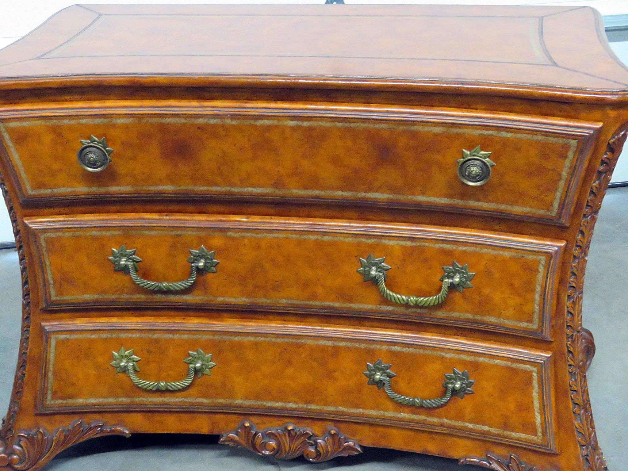Lineage three-drawer, leather upholstered chest of drawers.