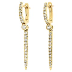 Orecchini Huggie Hoop con diamante lineare in oro 14 carati