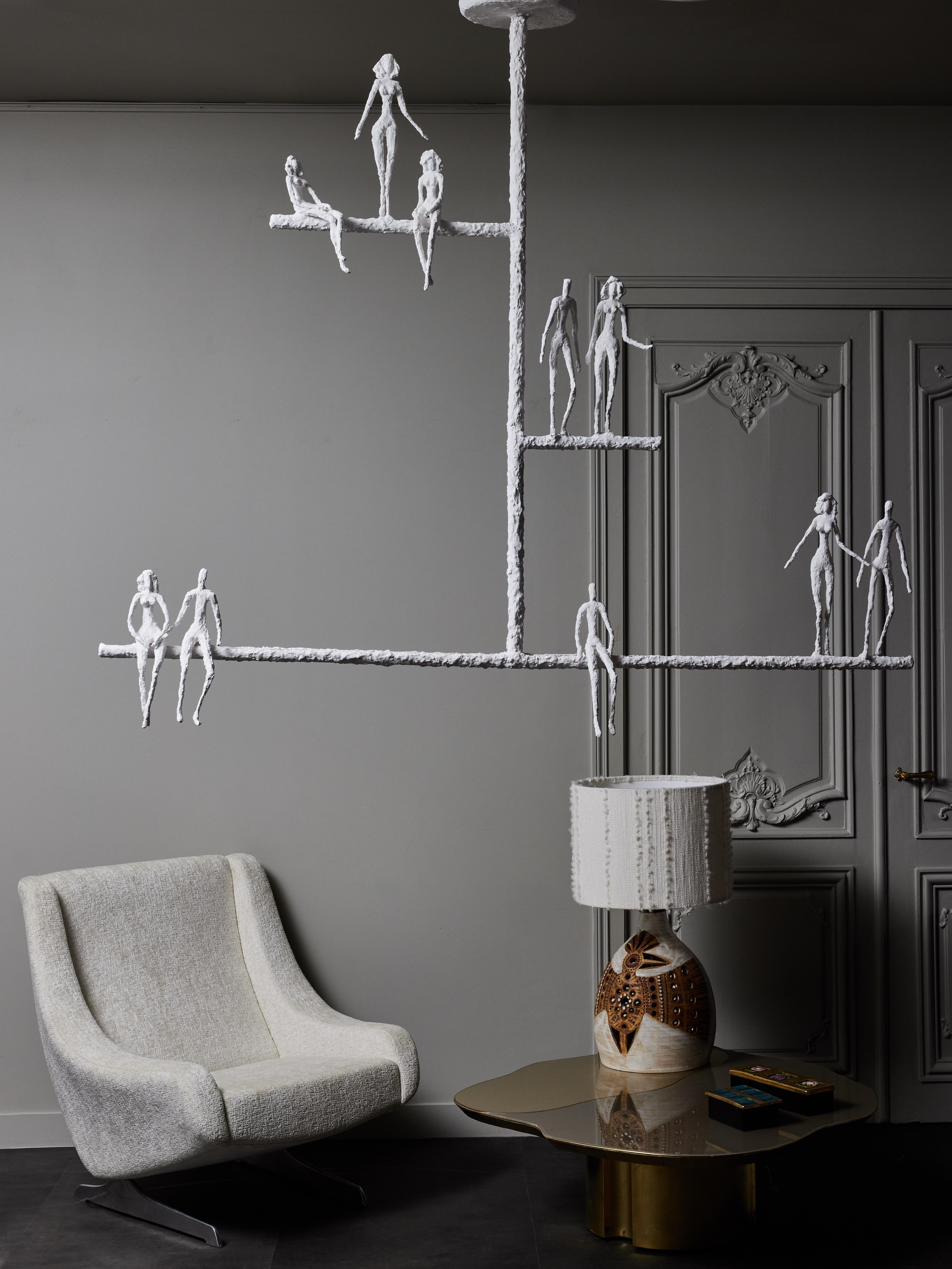 Modern Linear Plaster Chandelier with Characters by Glustin Luminaires For Sale