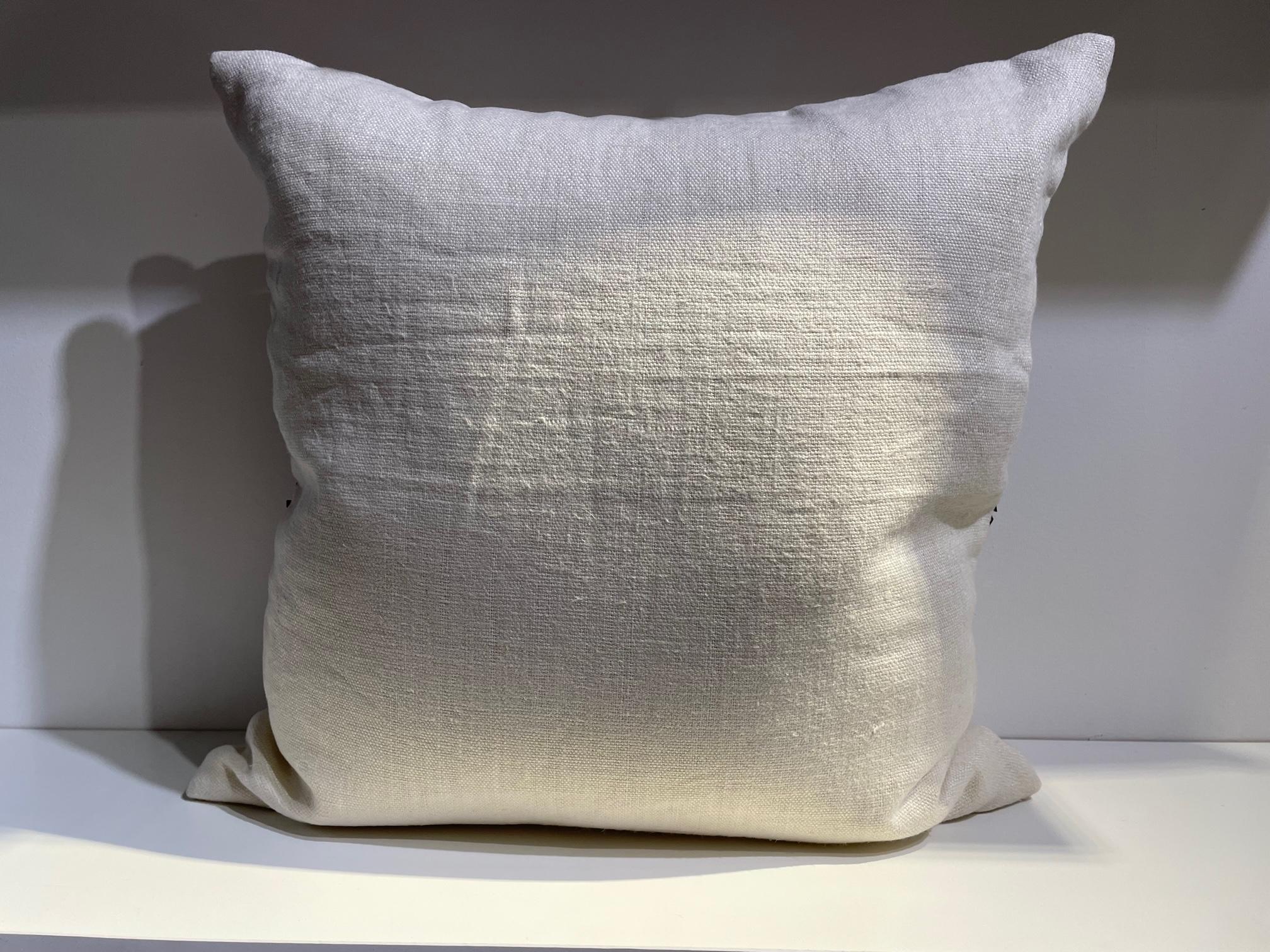 cushion size 50x50cm, hand embroidered with metal sequins col. Dark silver, base fabric handwoven linen col. Off-white, cushion cover with cotton lining, self piped, concealed zip, inner pad 100% new goose feathers.