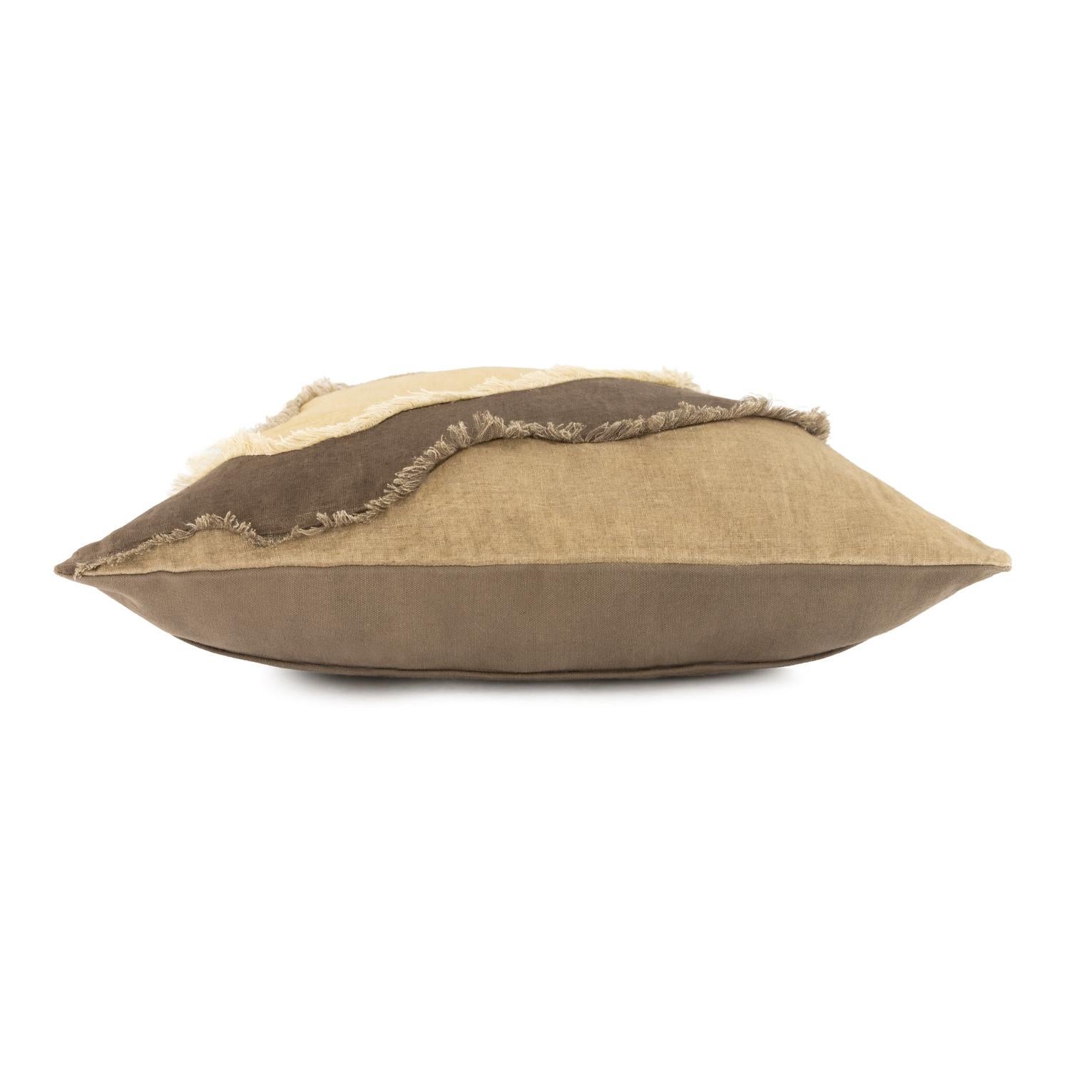 Crafted from natural fibers and botanically dyed, this patchwork pillow cover features a tonal palette of deep olive green and washed out greens. 
The front is breathable linen; the back, durable cotton duck—offering a considered balance of texture
