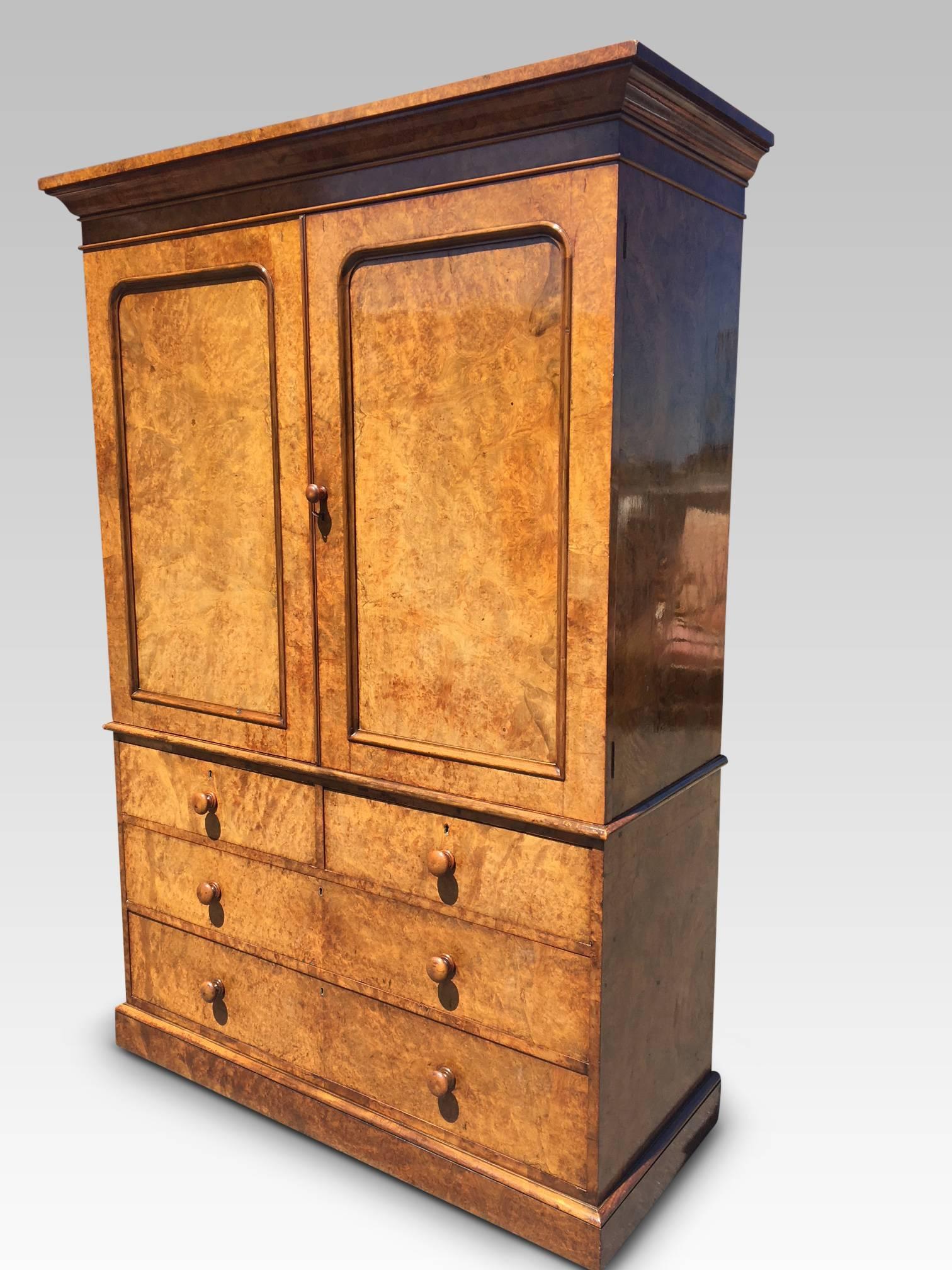 Fine quality English Burr Walnut linen press by the renowned company of Heal & Sons, London, circa 1850
This delightful linen press is veneered in burr walnut on mahogany. The doors close neatly, are flat and open to reveal four beautifully made
