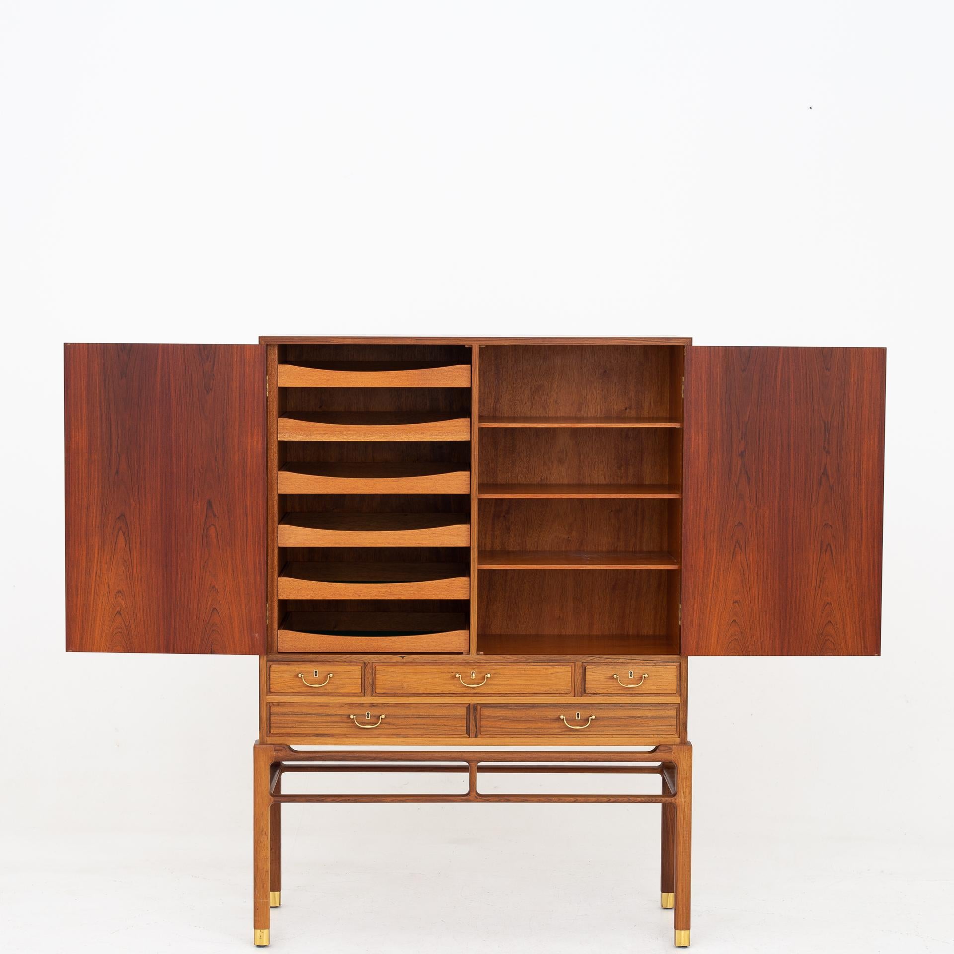 Linen-press in rosewood with drawers, trays and shoes of brass. Jørgen Berg. Maker William Christensen.