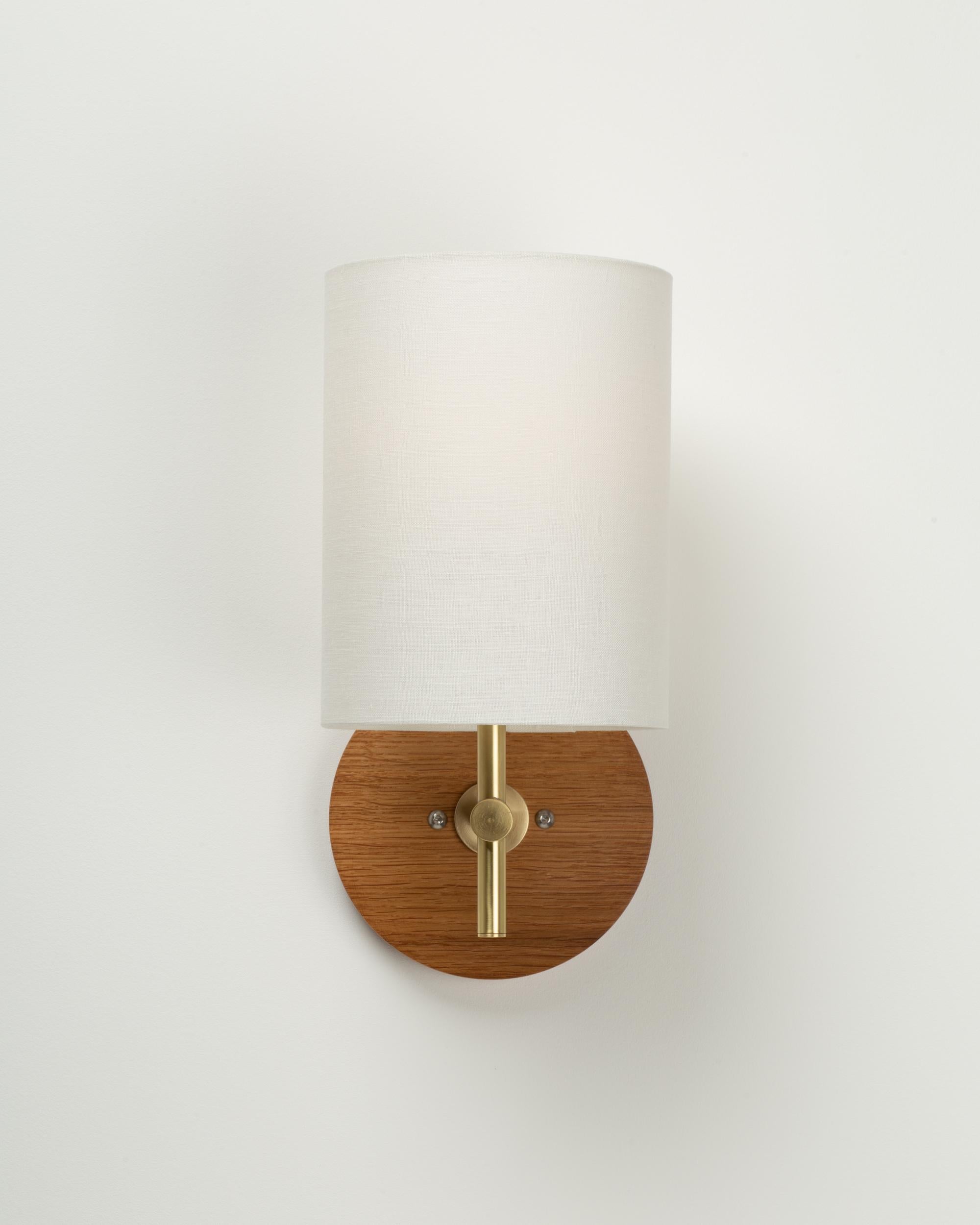 Linen Shade Wall Light 
Oak Wall Flush Mount Disc
2000K - 2800K  95CRI
600 Dim to Warm Lumens 
Hard Wired
Sphere III Bulb Included
Custom Linen Shade Colours available on request. 
Satin Silk Colours also available. 
Smoked Oak available on request.