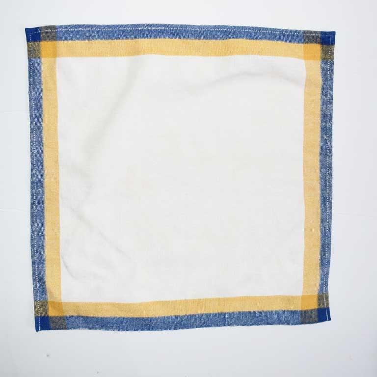 blue and yellow cloth napkins