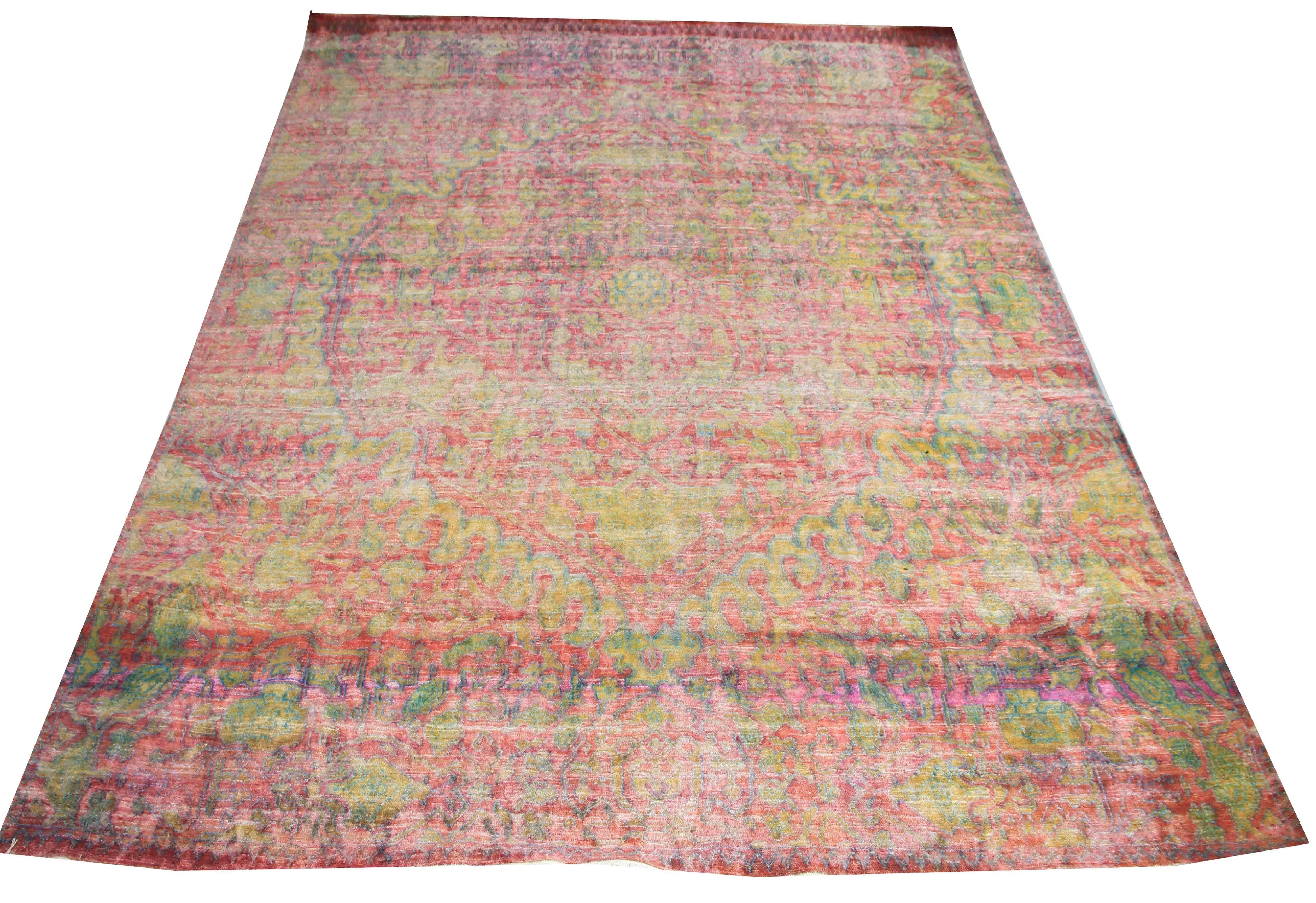 Handmade in Jaipur, India from a raw blend of wool linen & Silk, this Khotan rug dazzles the senses with pink & yellow. Every pattern is unique, drawing inspiration from different eras as far back as ancient textiles are interwoven with mid-century