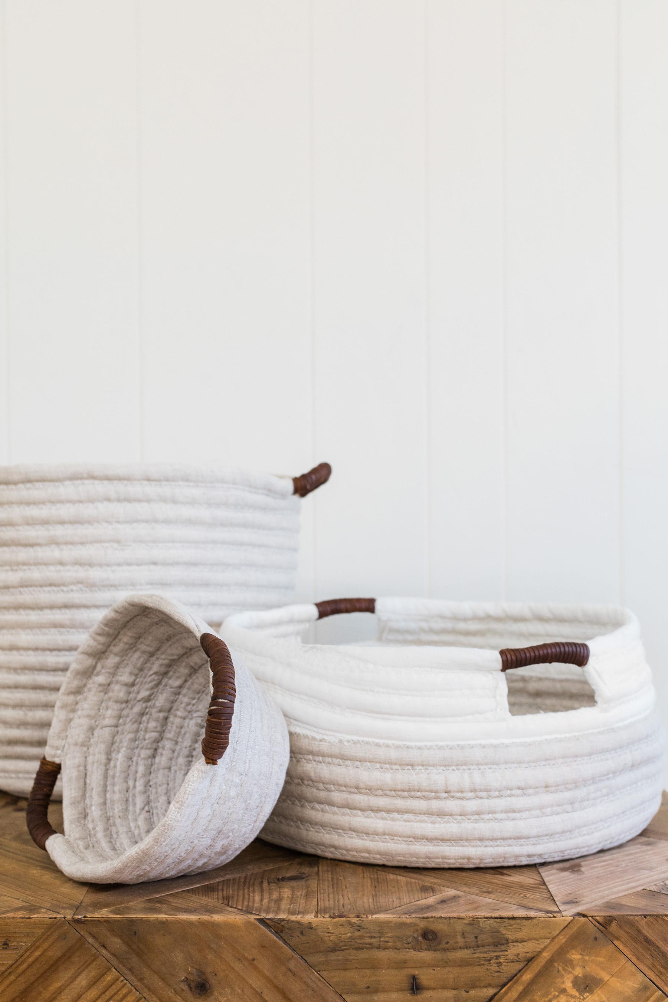 woven basket with leather handles