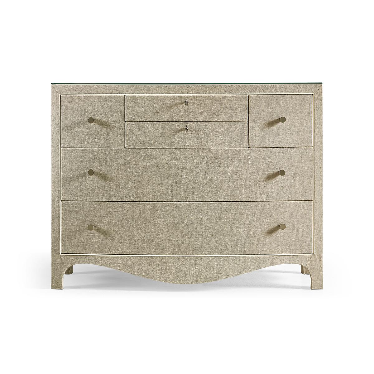 Linen wrapped Georgian chest, equally suited as a nightstand or hall chest, the chest imparts a classic form wrapped in Kravet performance linen to the top and case front. Impeccable design standards include a decorative tassel on the top middle