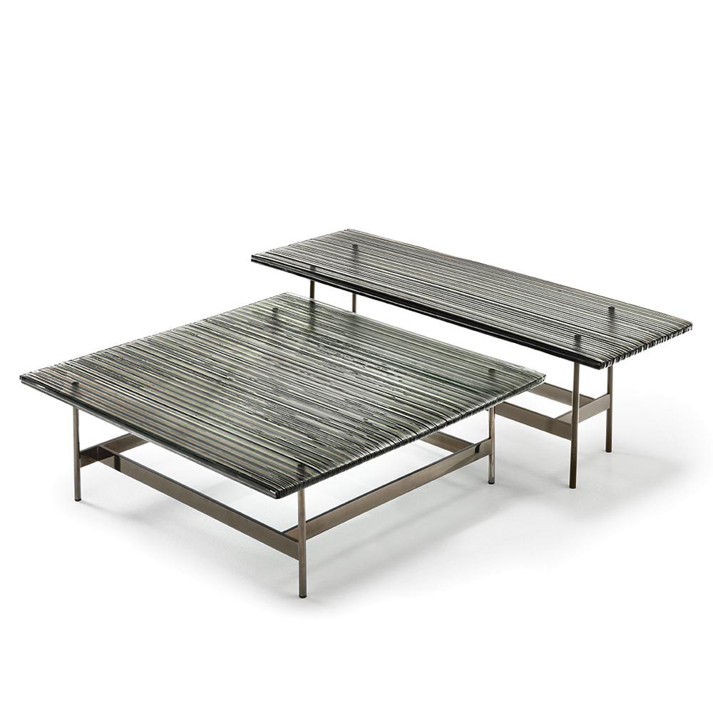 Coffee table lines glass top with smoked glass top in
23 mm thickness DV glass. With base available in forged
metal opaque titanium or in glossy black nickel. Available in:
L 90 x D 90 x H 30 cm, price: 4350,00€
L 120 x D 120 x H 35 cm, price: