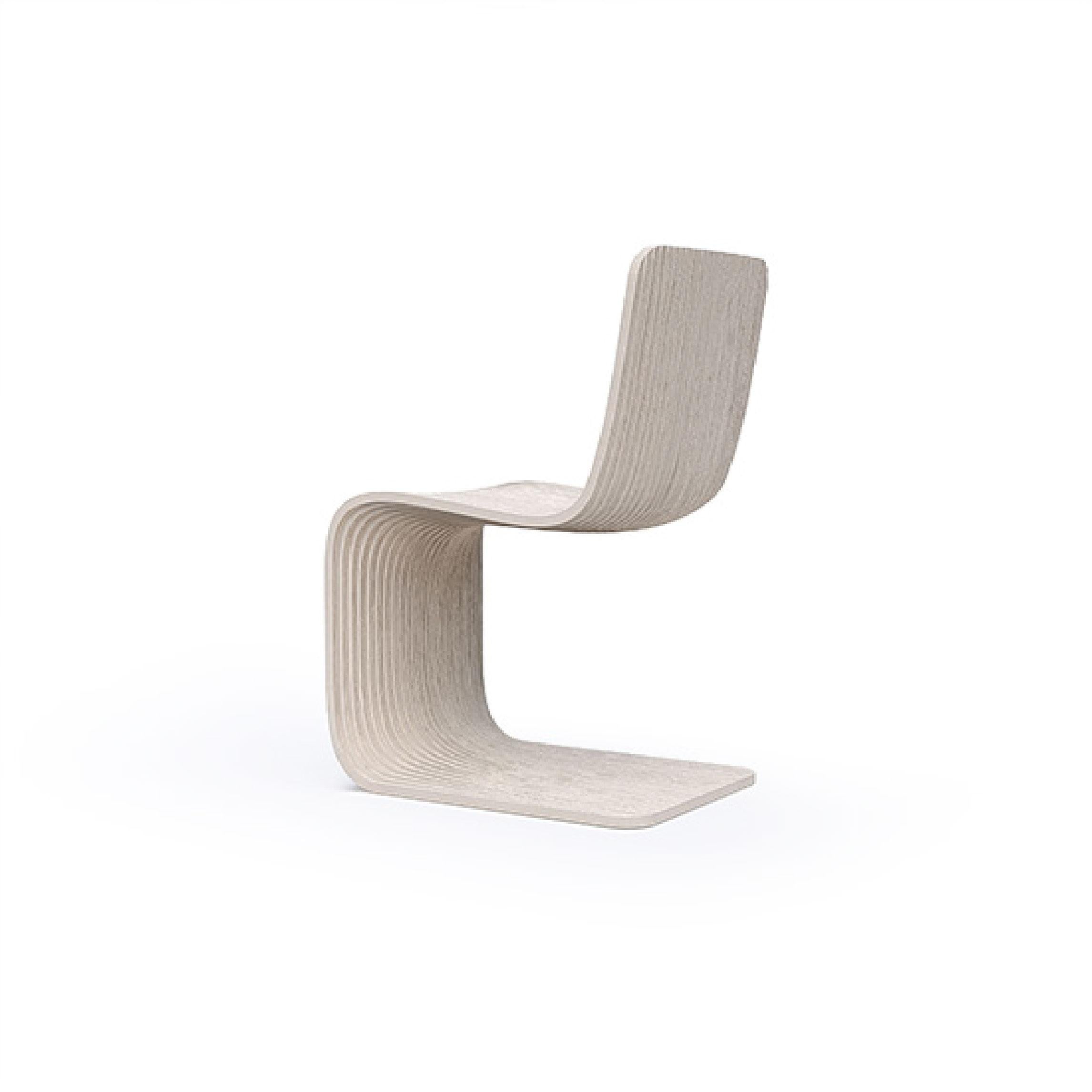 The Line S Dining Chair is a masterful blend of modern elegance and functional design. Crafted with precision, this chair features clean, straight lines that exude a minimalist aesthetic, making it an ideal addition to any contemporary dining