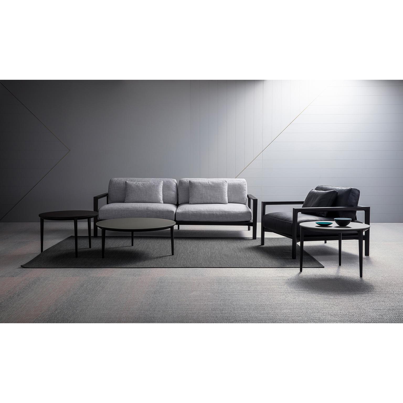 Ling is a beautifully detailed and elevated seating range with chameleon-like qualities choose a natural ash frame and Ling evokes a sense of Danish design and sculptural simplicity. In the carbon stain, the pieces has greater intensity and a more