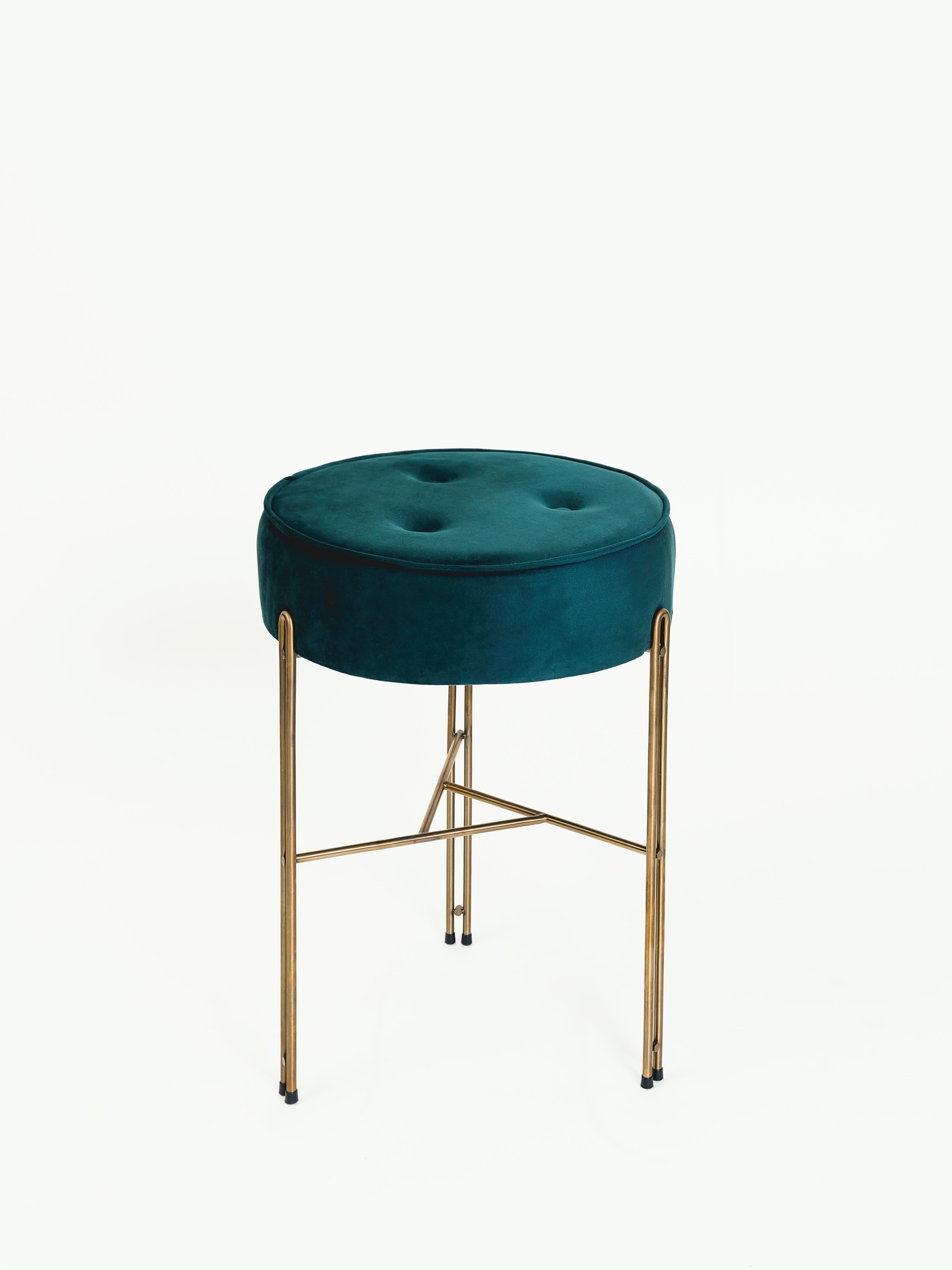 The Linha collection was designed from the top to bottom. The first piece of this collection is the planter pedestal. One of the other pieces in this collection is this upholstered stool.

