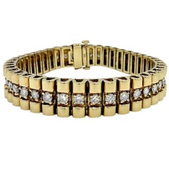 A Link-Armband aus 14k Gold und Diamanten