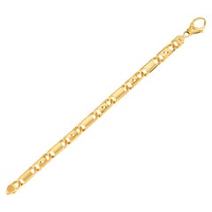 Link bracelet in 14k yellow gold.