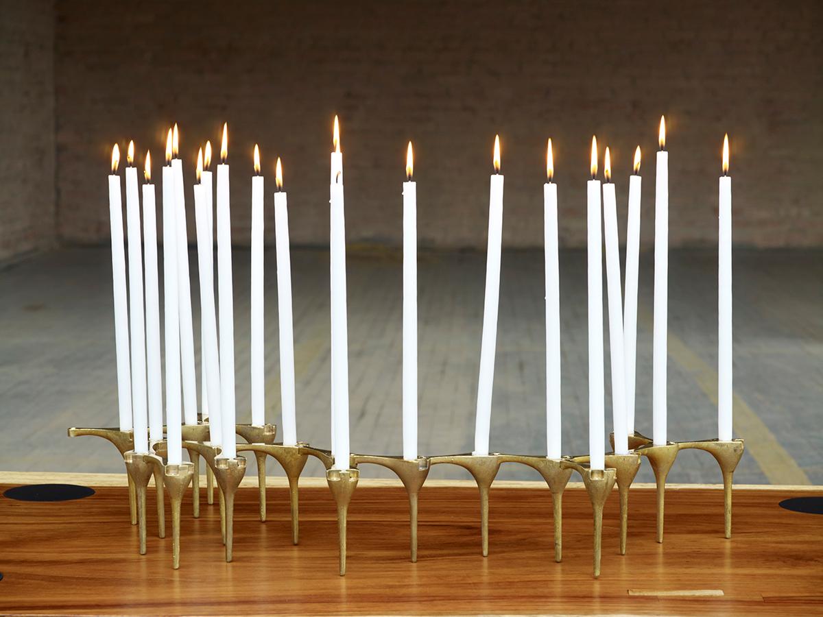 The Link Candle Holder is a modular system that can be expanded to any size, available in cast brass. Sold as a set of five. (not available in cast iron at this time, only brass)

Founded in 2011, AKMD developed out of a thirteen-year friendship and