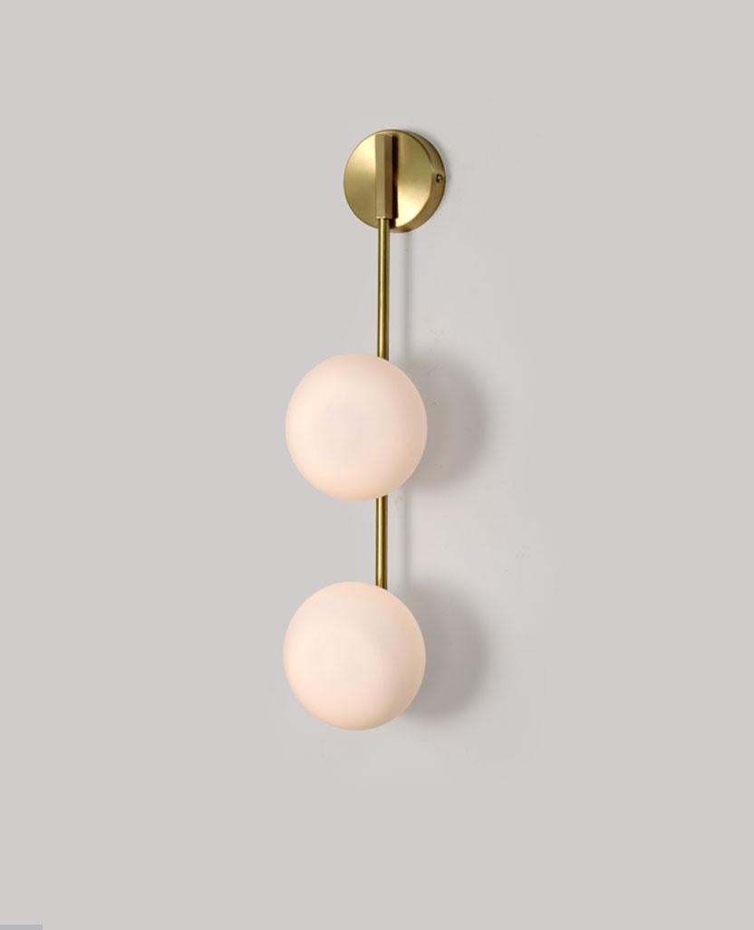 Link One Glass Globe Wall Sconce by Lamp Shaper
Dimensions: D 11.5 x W 11.5 x H 48.5 cm.
Materials: Brass and glass.

Different finishes available: raw brass, aged brass, burnt brass and brushed brass Please contact us.

All our lamps can be wired