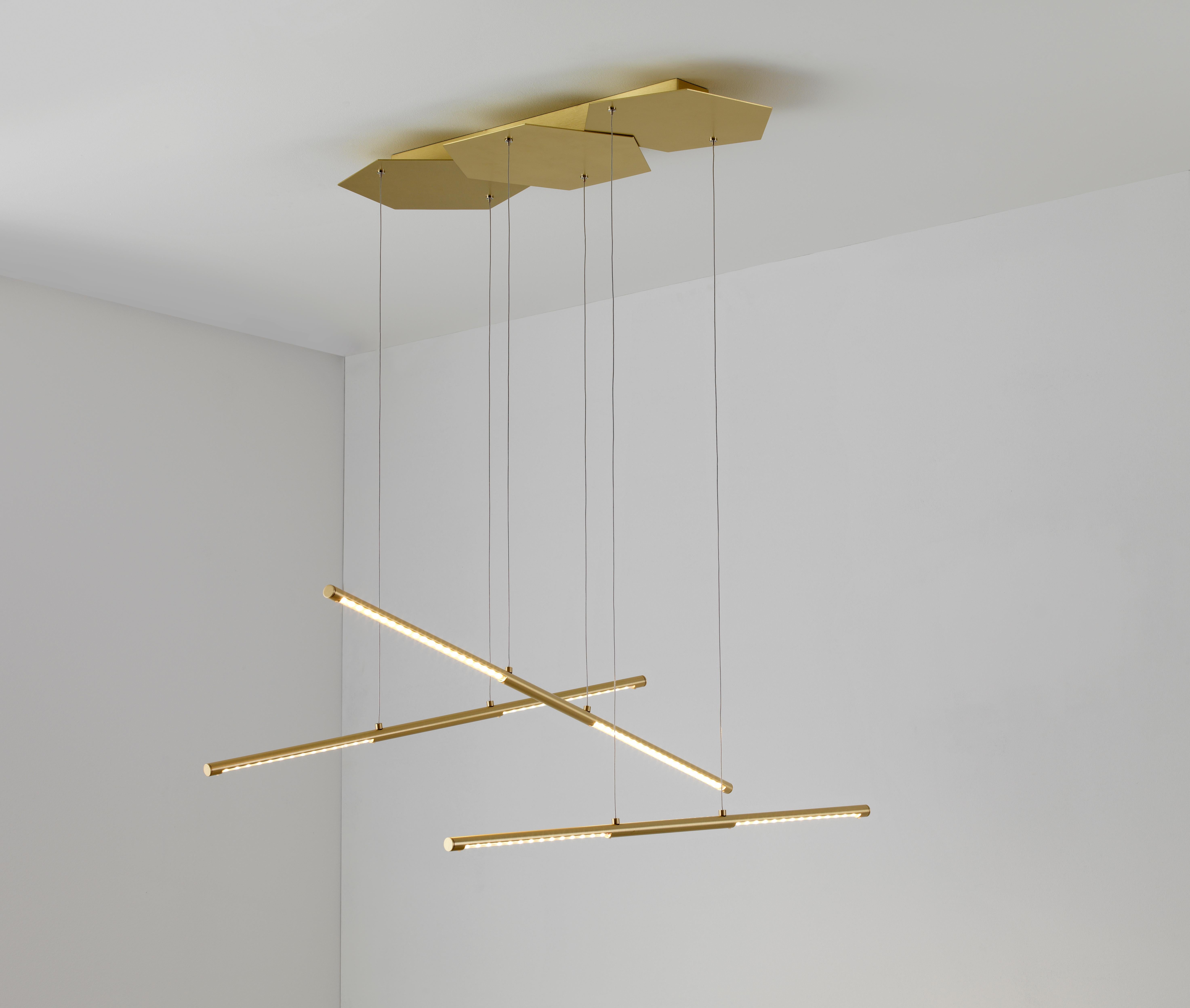 Link pendant by Emilie Cathelineau
Dimensions: D 59 x W 5.5 x H 100 cm
Materials: Solid brass, Satin Polycarbonate diffuser, Black textile cable (2m)
Others finishes and dimensions are available.

All our lamps can be wired according to each