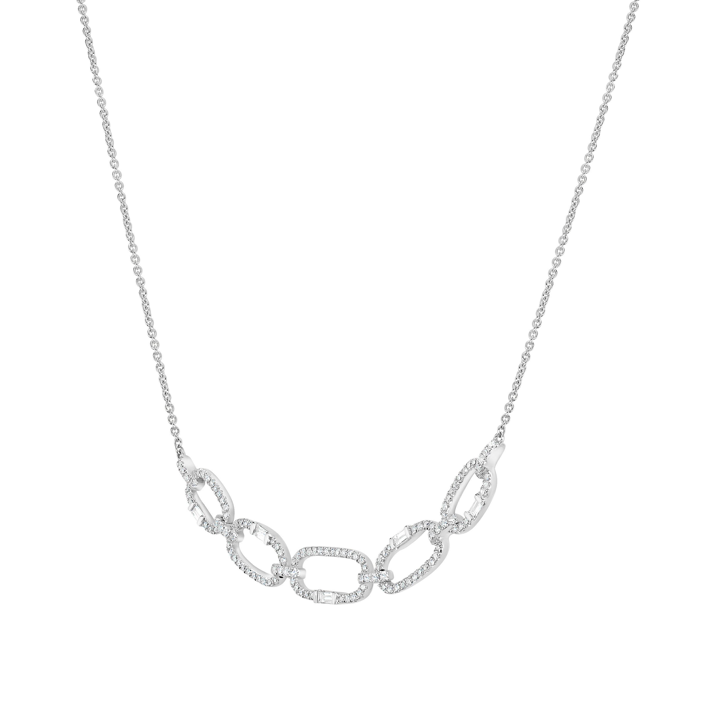 This Round and Baguette Diamond Link Pendant Necklace graces the neckline in a stylish modern silhouette. Crafted Luxle in 14K White Gold, this pendant shimmers with 122 round diamonds and 5 baguette diamonds totaling 0.45Ct. The pendant is