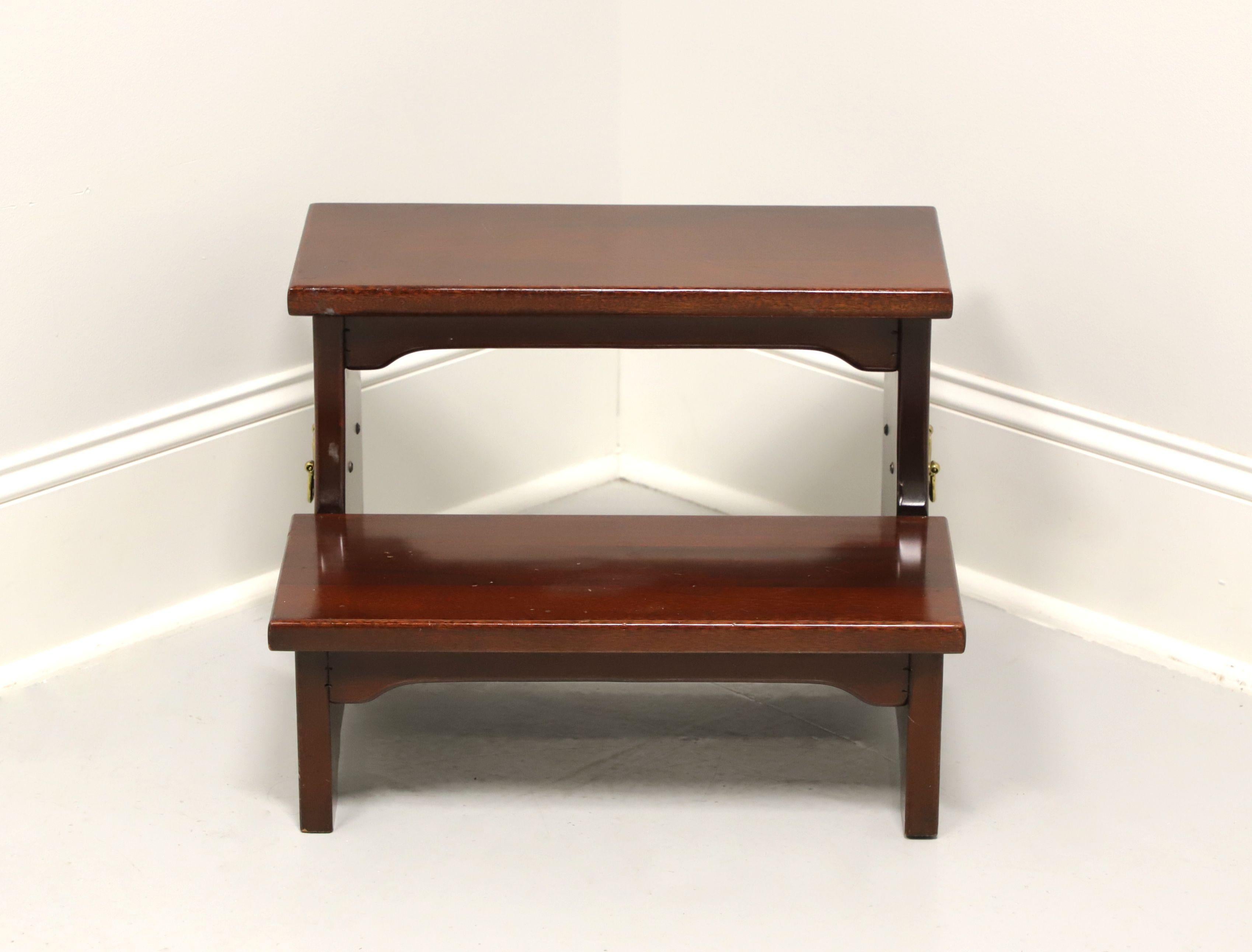 High quality bed steps in the Chippendale style by Link-Taylor. Solid heirloom mahogany, brass side handles and two step risers. Made in Lexington, North Carolina, USA, in the late 20th Century.

Style #: 910-940

Measures: 20 W 17.25 D 14 H

Very