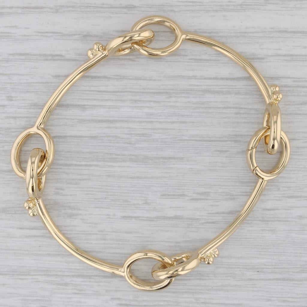 Metal: 18k Yellow Gold
Weight: 26.8 Grams 
Stamps: 750
This bracelet is signed with an artisan mark.
Style: Linked Bars
Closure: Oval Spring Ring Clasp
Inner Circumference: 7