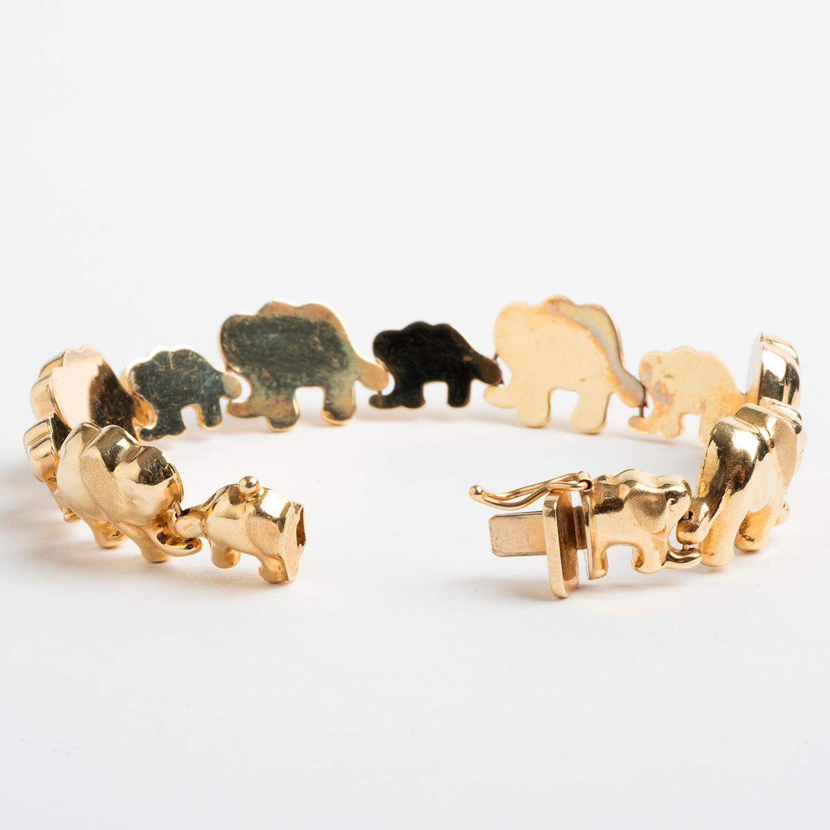 Linked Elephants Bracelet, 14 Karat Yellow Gold, Vintage circa 1980s In Good Condition In Canterbury, England